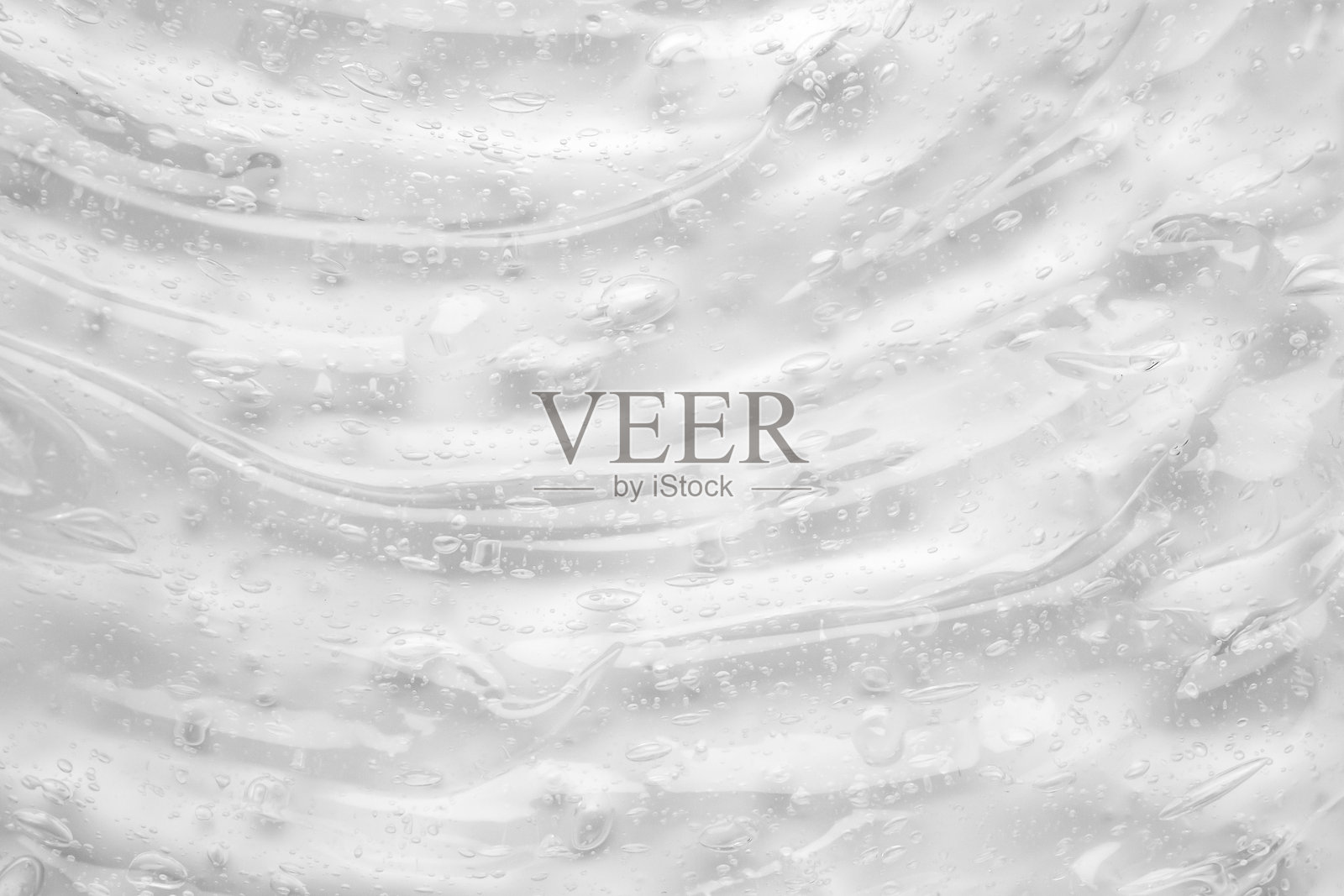 透明清澈的液体精华胶状化妆品质地背景照片摄影图片