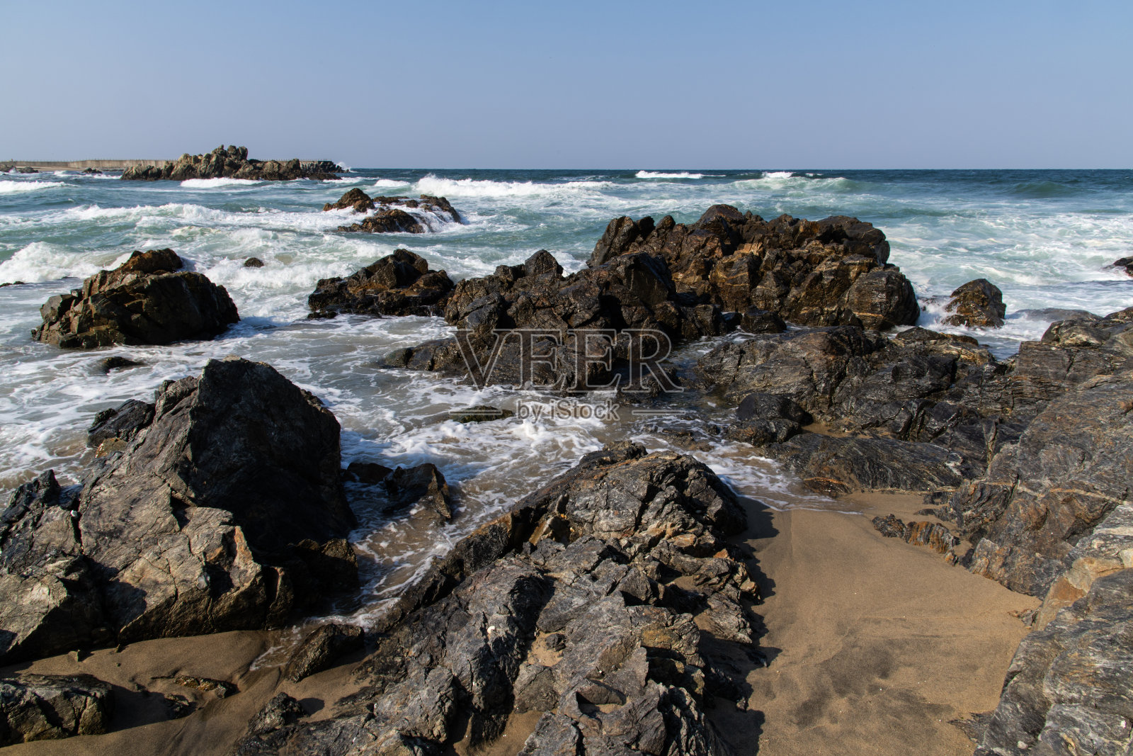 海上破浪与岩石照片摄影图片