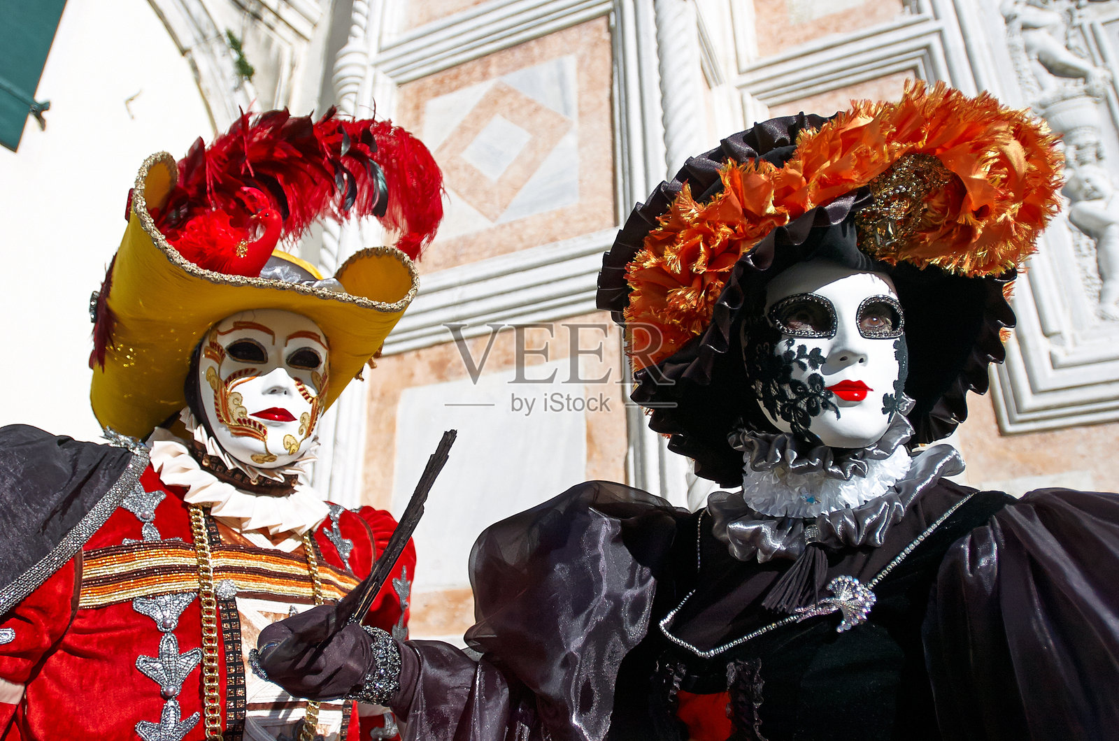 威尼斯服装参加威尼斯狂欢节。照片摄影图片