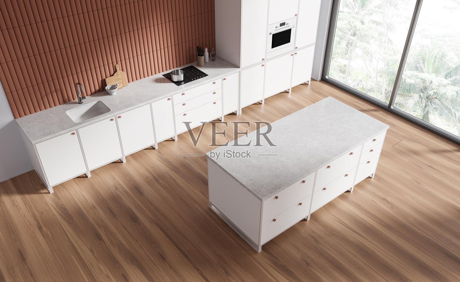 家庭厨房内部的顶视图，设有吧台，靠近窗户的厨柜照片摄影图片