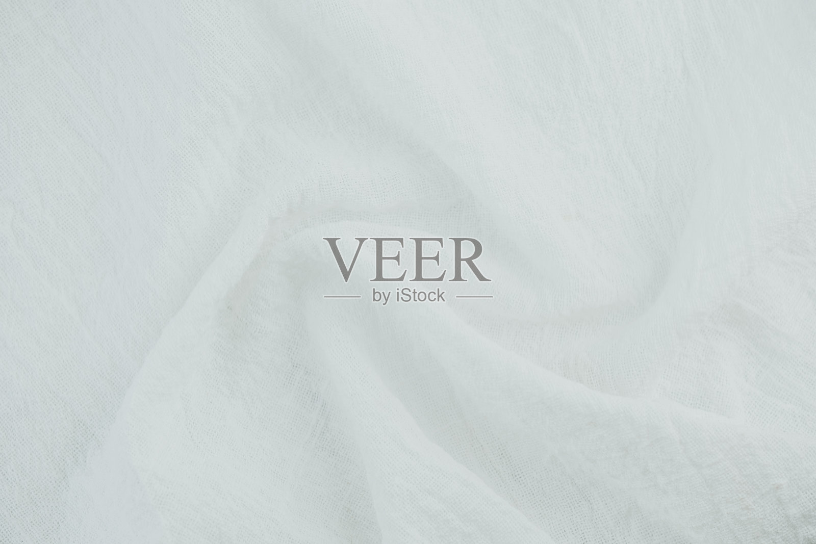 柔软的象牙白棉布，具有纹理，适用于生态产品或服装背景照片摄影图片