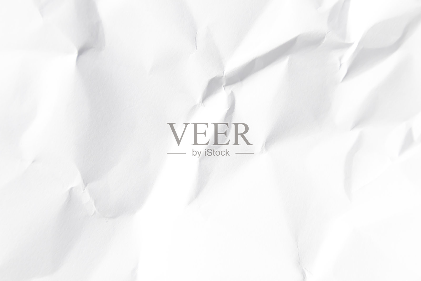 中等褶皱的中亮度白色皱纸用于背景插图。照片摄影图片