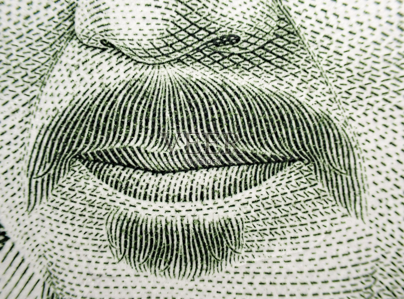 钞票上的人类嘴巴图案设计照片摄影图片