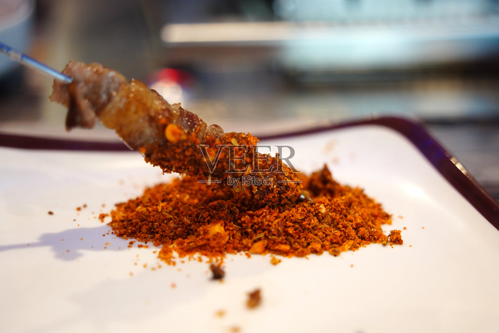 辣椒粉调味的串烧肉照片摄影图片