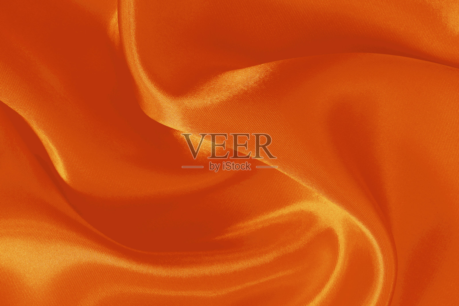 橙色织物纹理背景，丝绸或亚麻图案的细节。照片摄影图片