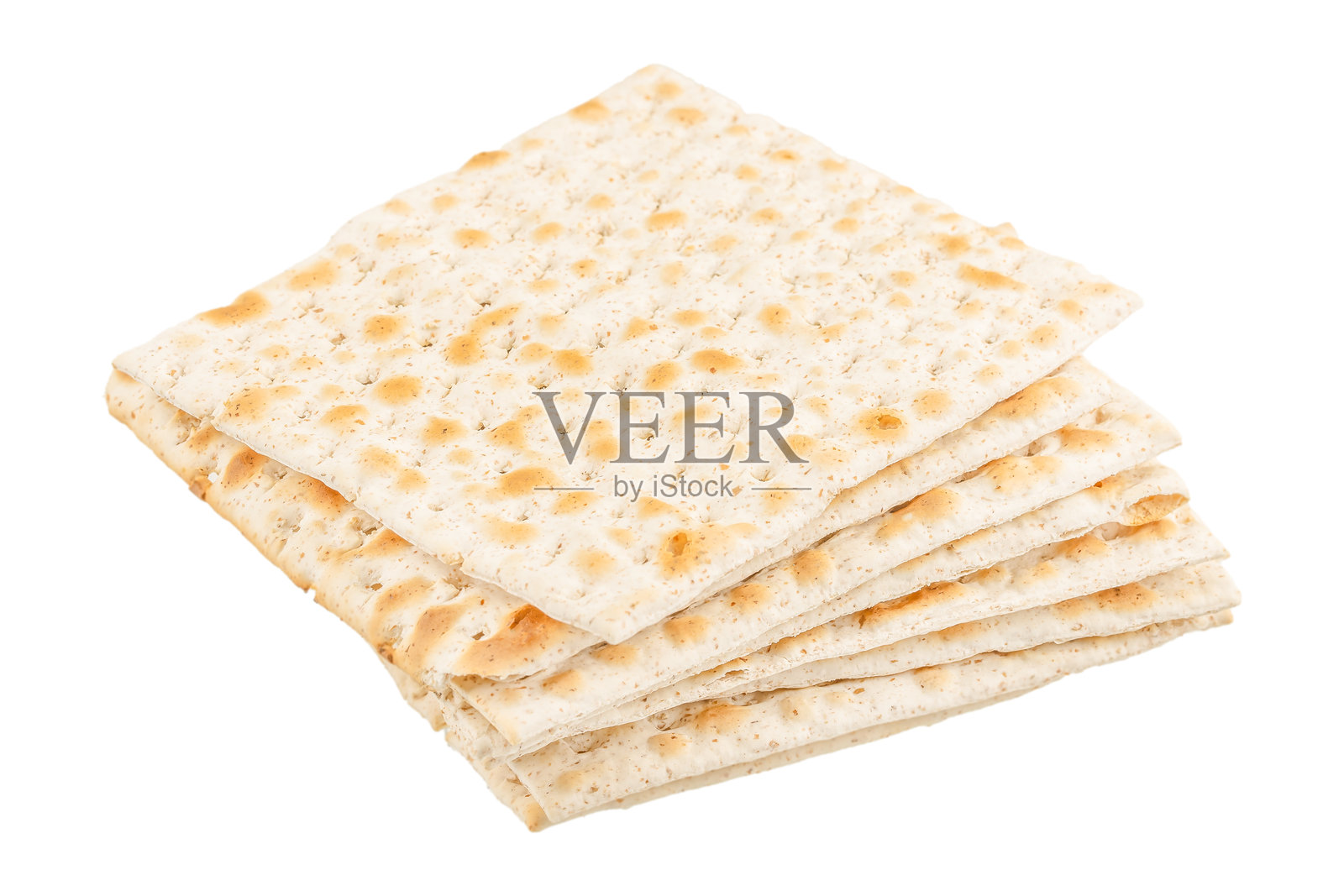 一堆传统犹太逾越节的无酵饼干，孤立在白色背景上照片摄影图片