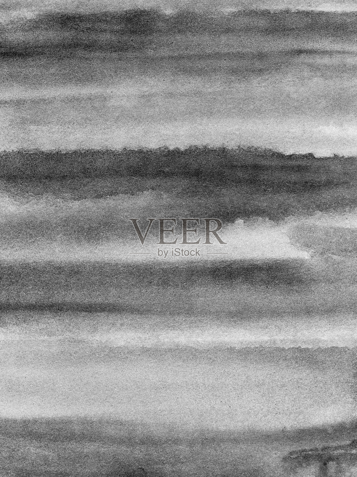 抽象灰色水彩背景。手工刷涂而成照片摄影图片