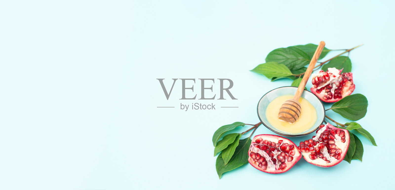 犹太新年，犹太人庆祝犹太历的新年，石榴与蜂蜜，节日传统美食照片摄影图片