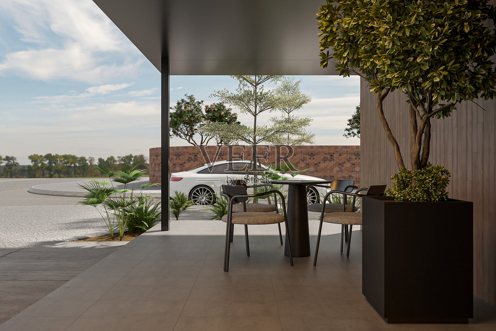 现代户外休息区，配有汽车和绿植照片摄影图片