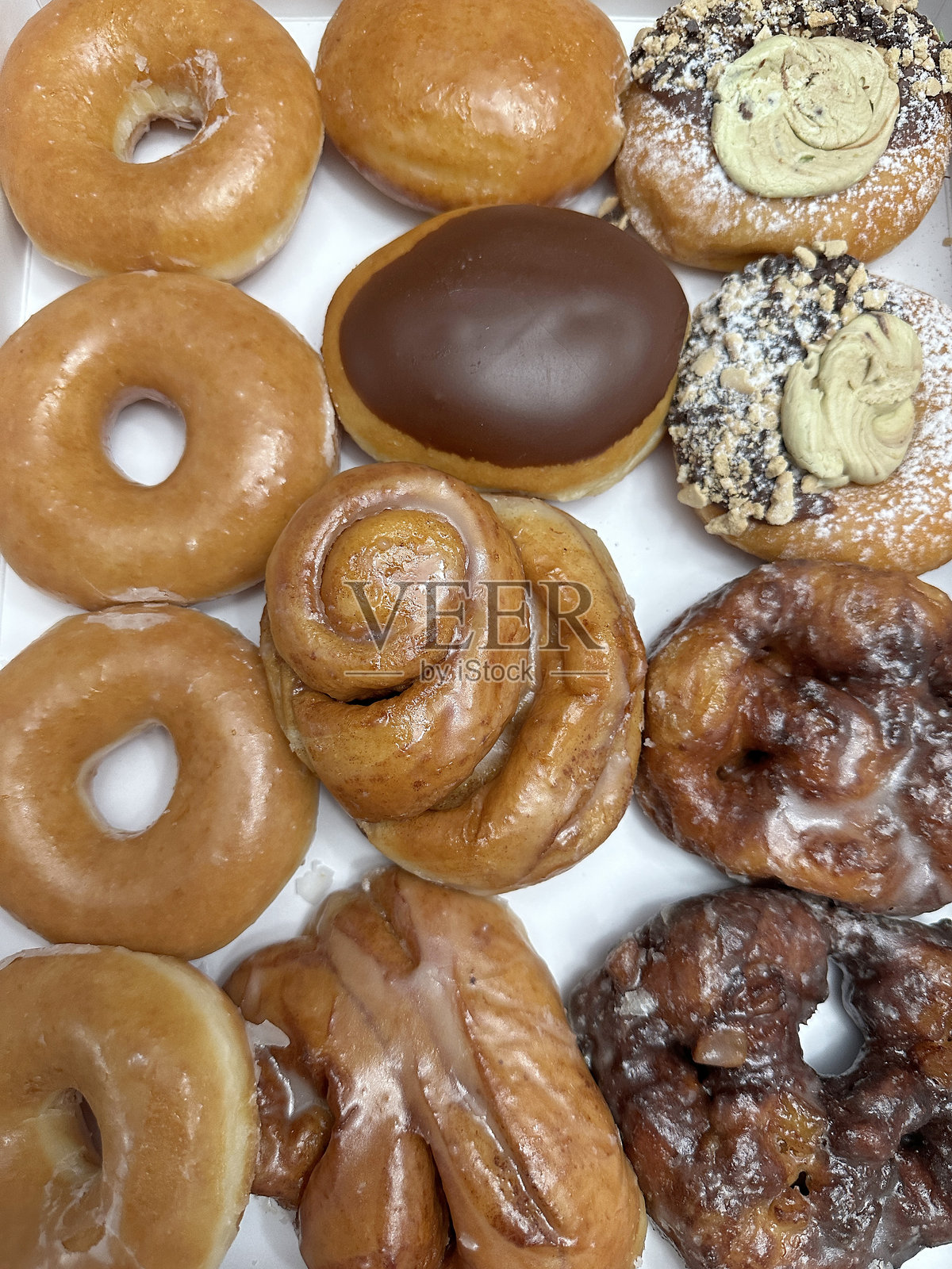 一盒甜甜圈照片摄影图片