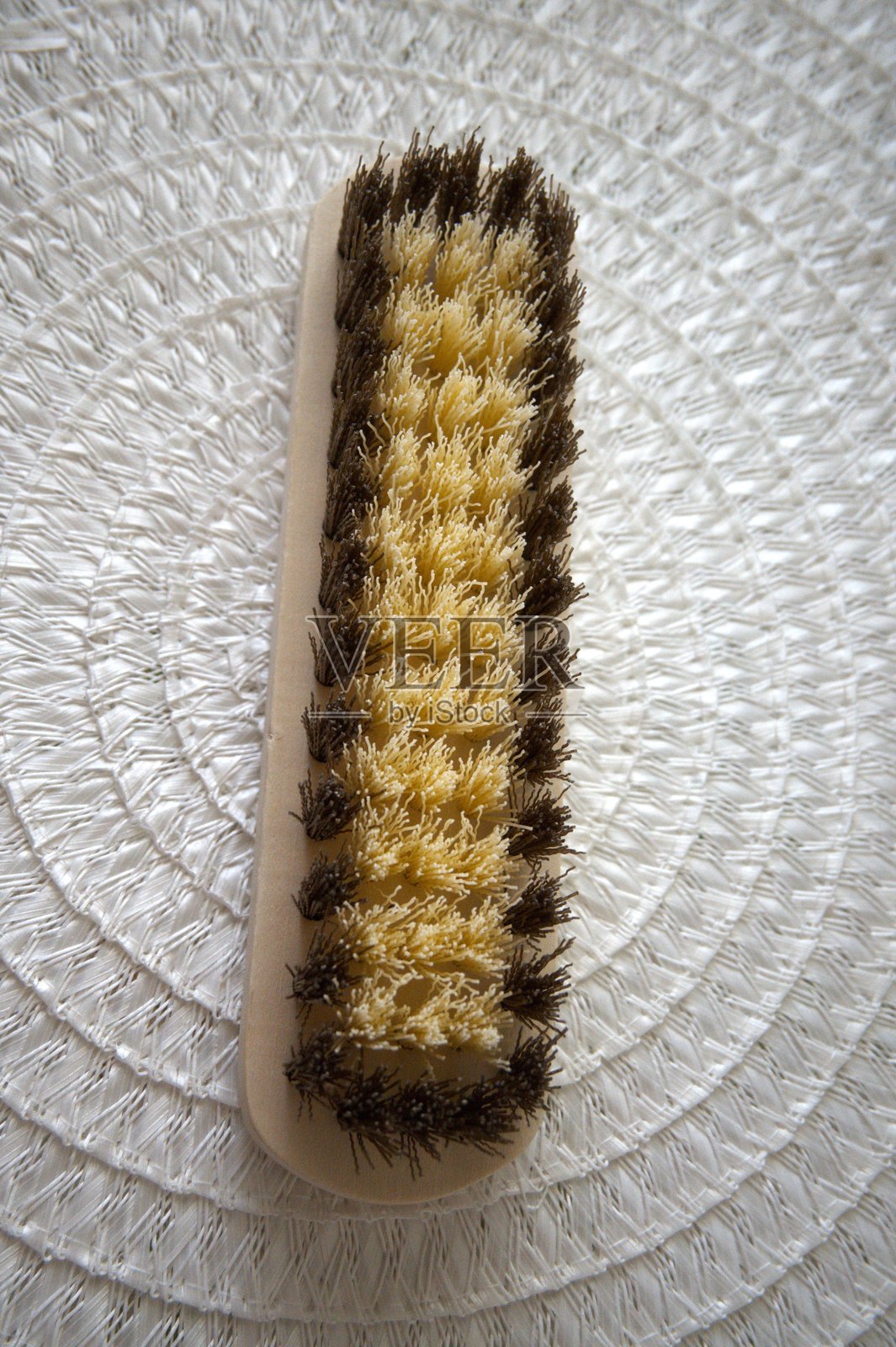 桌子上的清洁刷，特写照片摄影图片