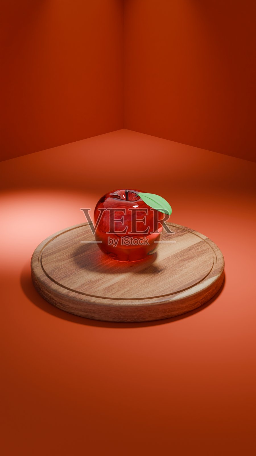 红墙上的玻璃苹果垂直展示在工作台上照片摄影图片