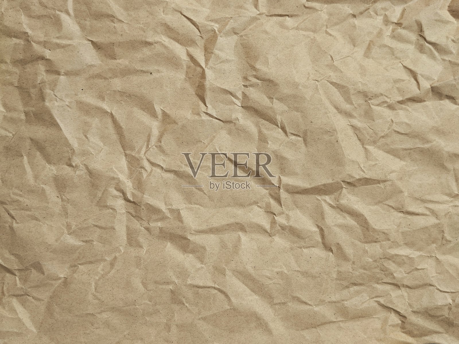 抽象的皱褶棕色纸张纹理背景照片摄影图片