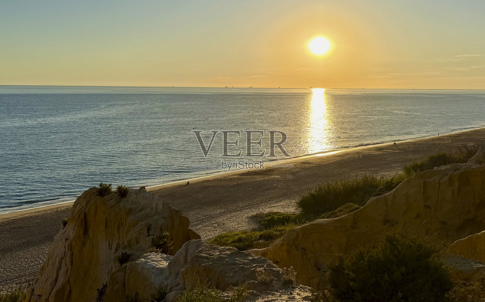 马萨戈恩海滩上的日落照片摄影图片