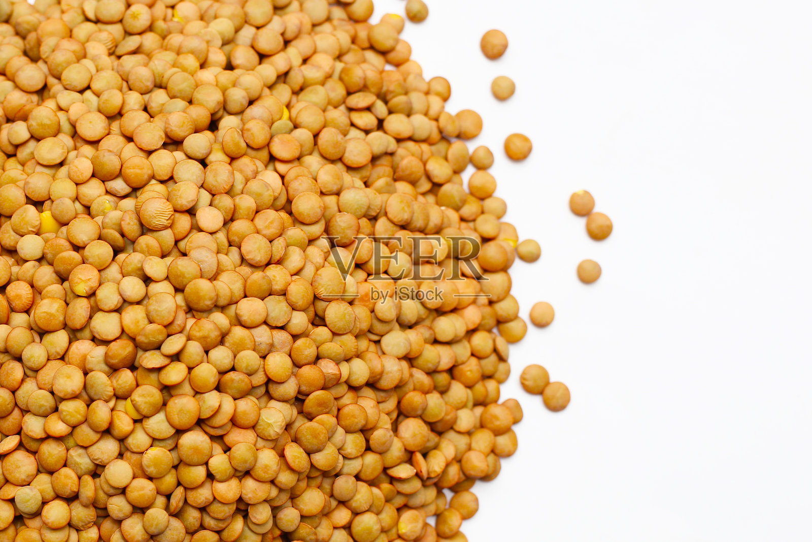 富含蛋白质的营养棕色扁豆。照片摄影图片