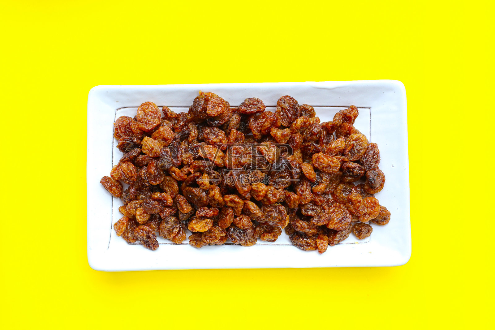 干燥的金色葡萄干，澳大利亚干果苏丹娜，甜美而有嚼劲。照片摄影图片