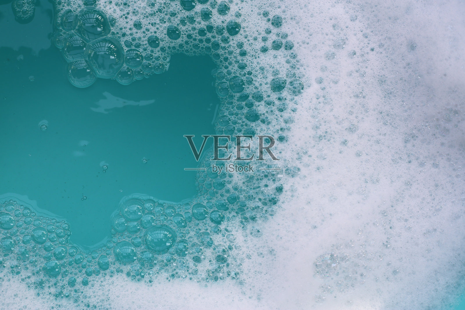 泡沫蓝色水面与气泡。照片摄影图片