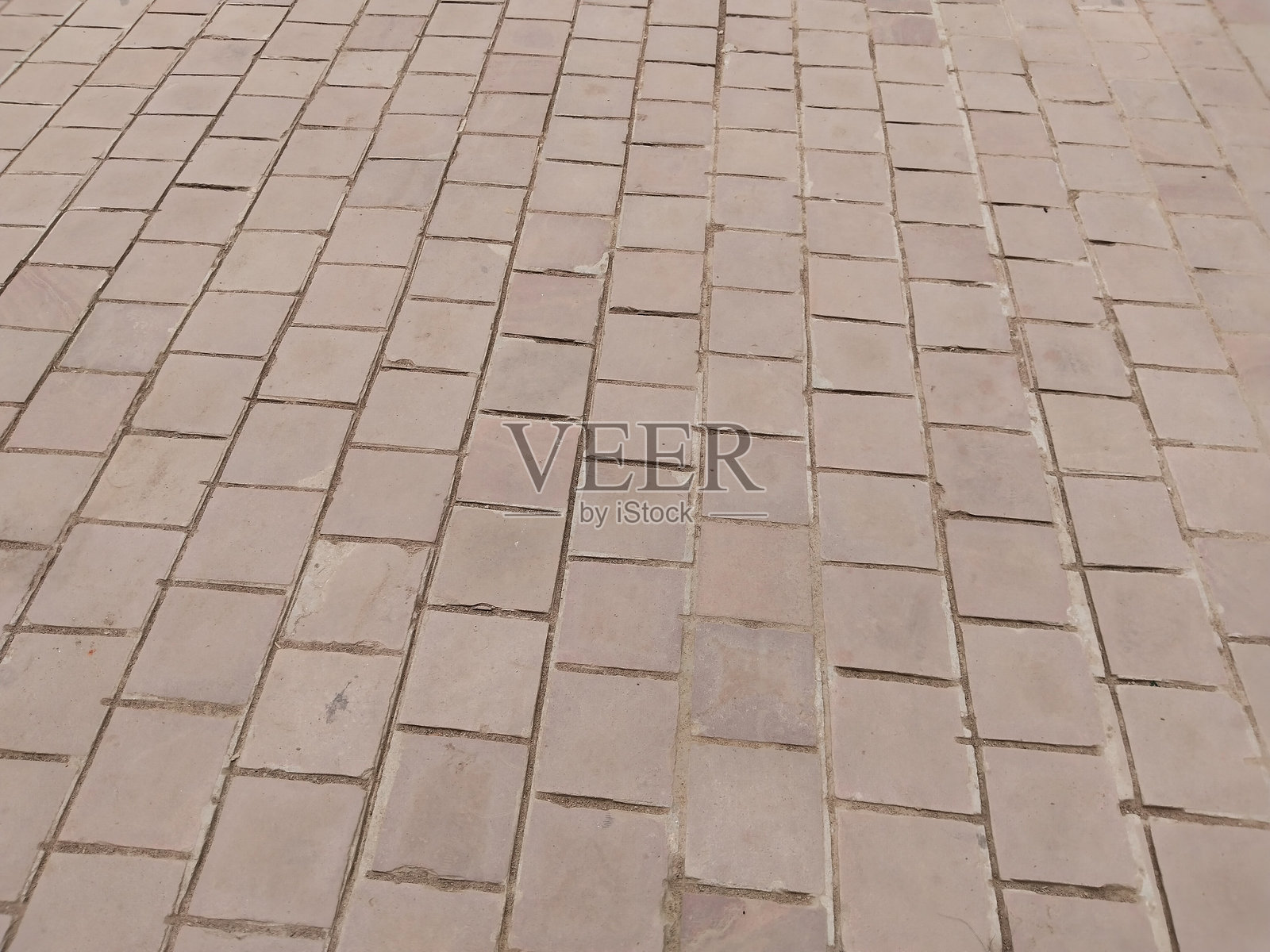 空旷的铺砌庭院，石砖地面，公共城市空间的户外地面，矩形铺砖的图案，花园或公园中的空白开放区域地面，乡村风格的人行道纹理背景照片摄影图片