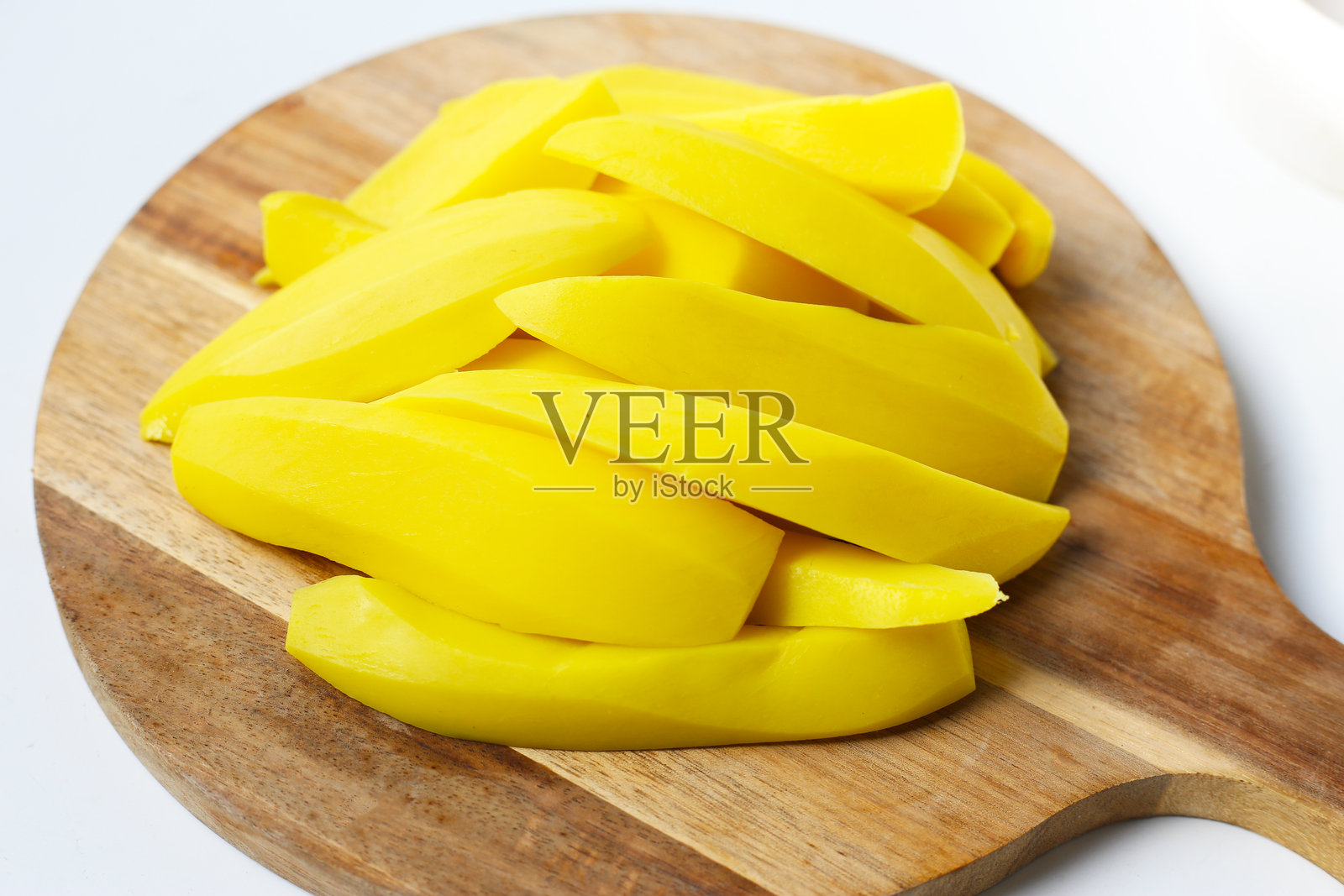 腌制的芒果片，甜脆可口照片摄影图片