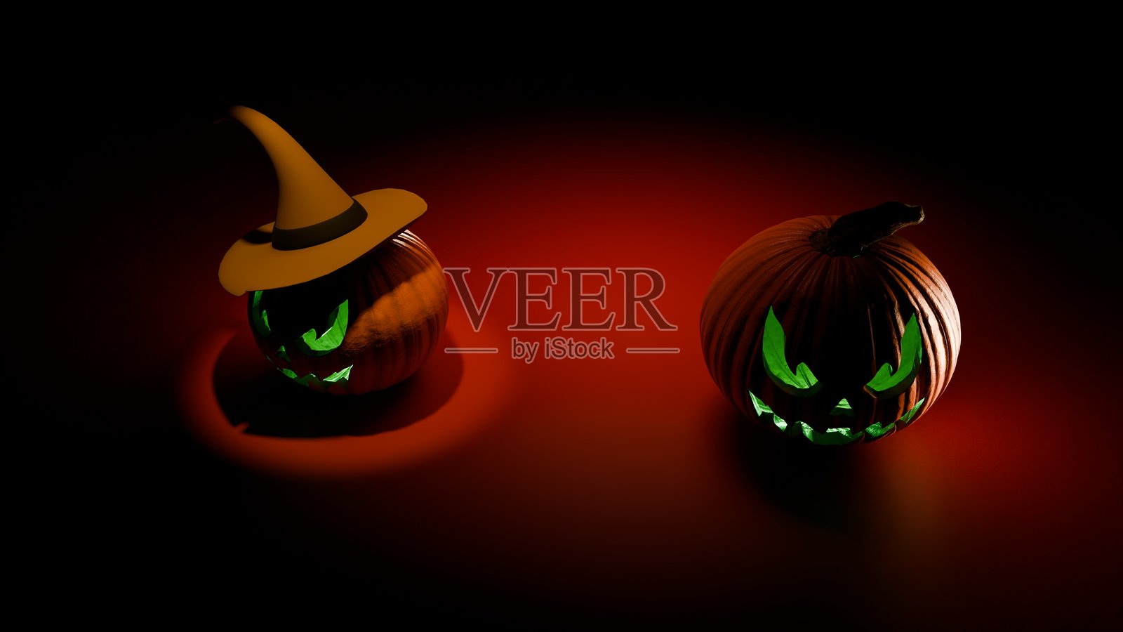 发光的万圣节南瓜灯，戴着女巫帽照片摄影图片