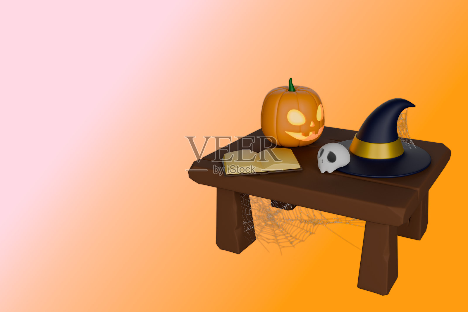 一组万圣节主题物品，包括一个发光的南瓜灯照片摄影图片