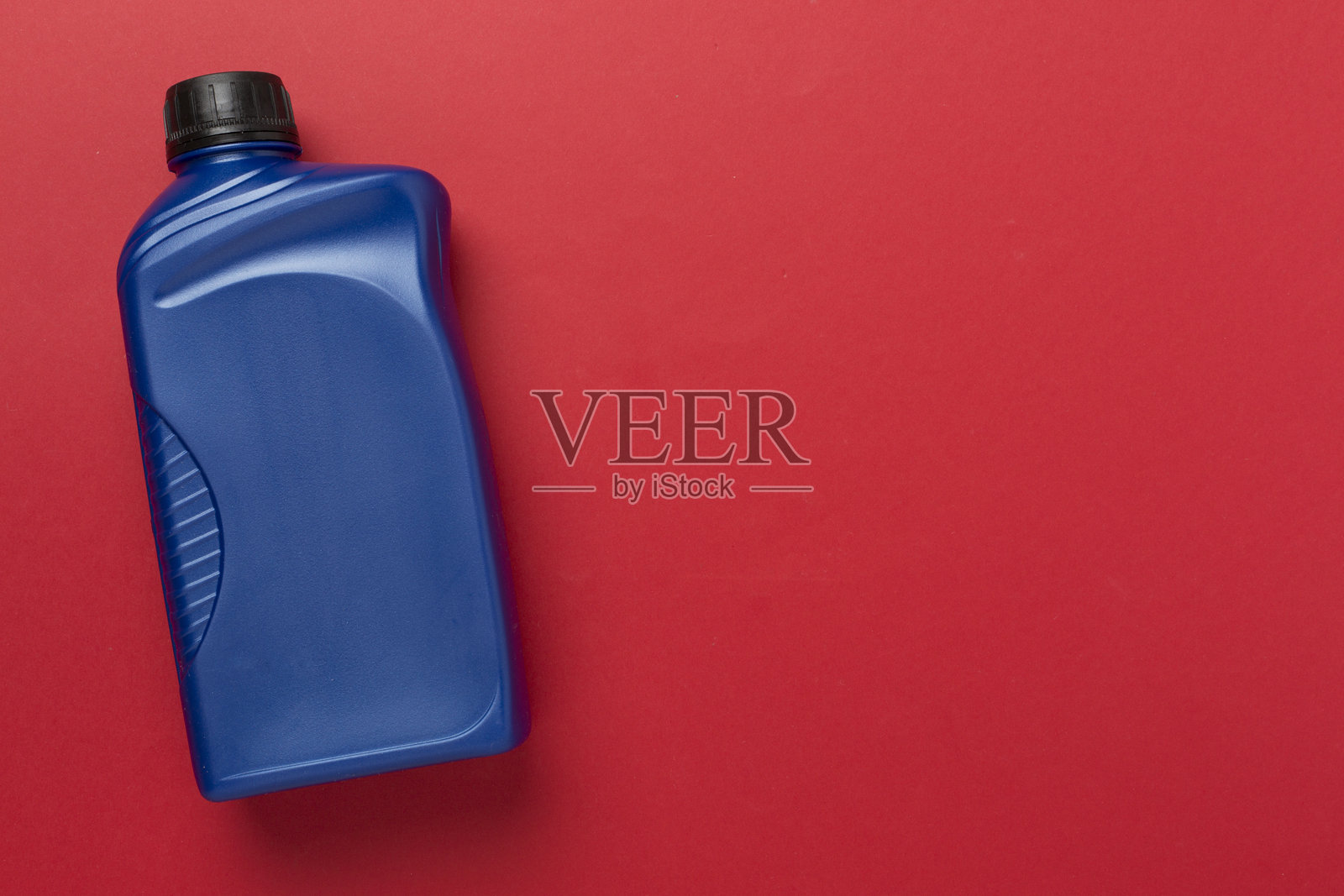 彩色背景上的机油，俯视图照片摄影图片