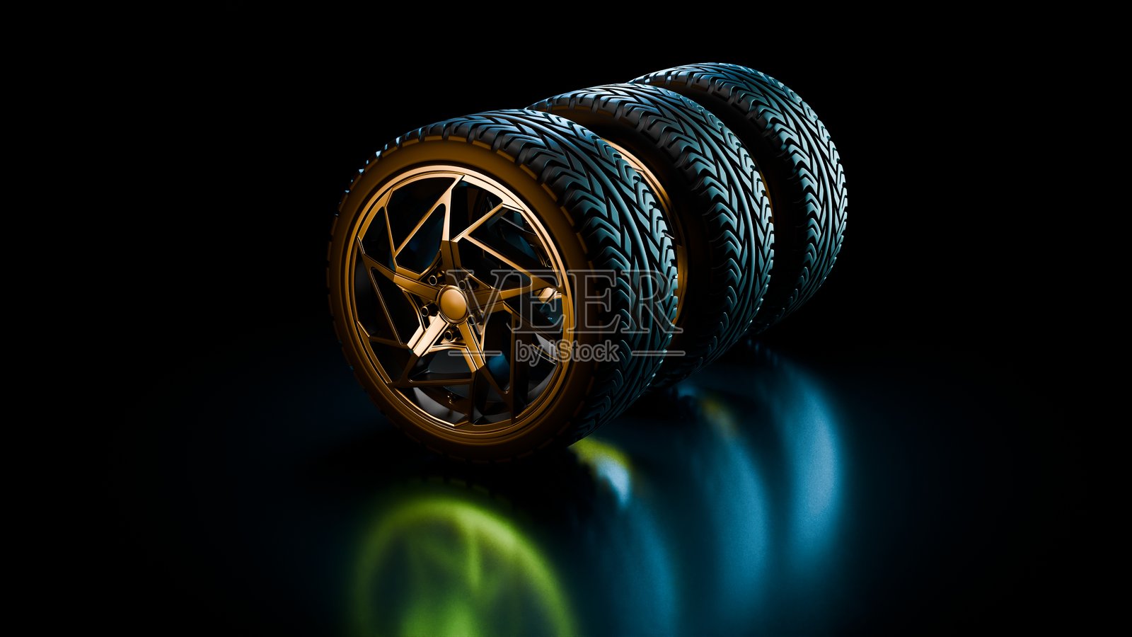 一堆金边汽车轮毂放置在黑色反光地板上，伴有蓝色灯光照射。照片摄影图片