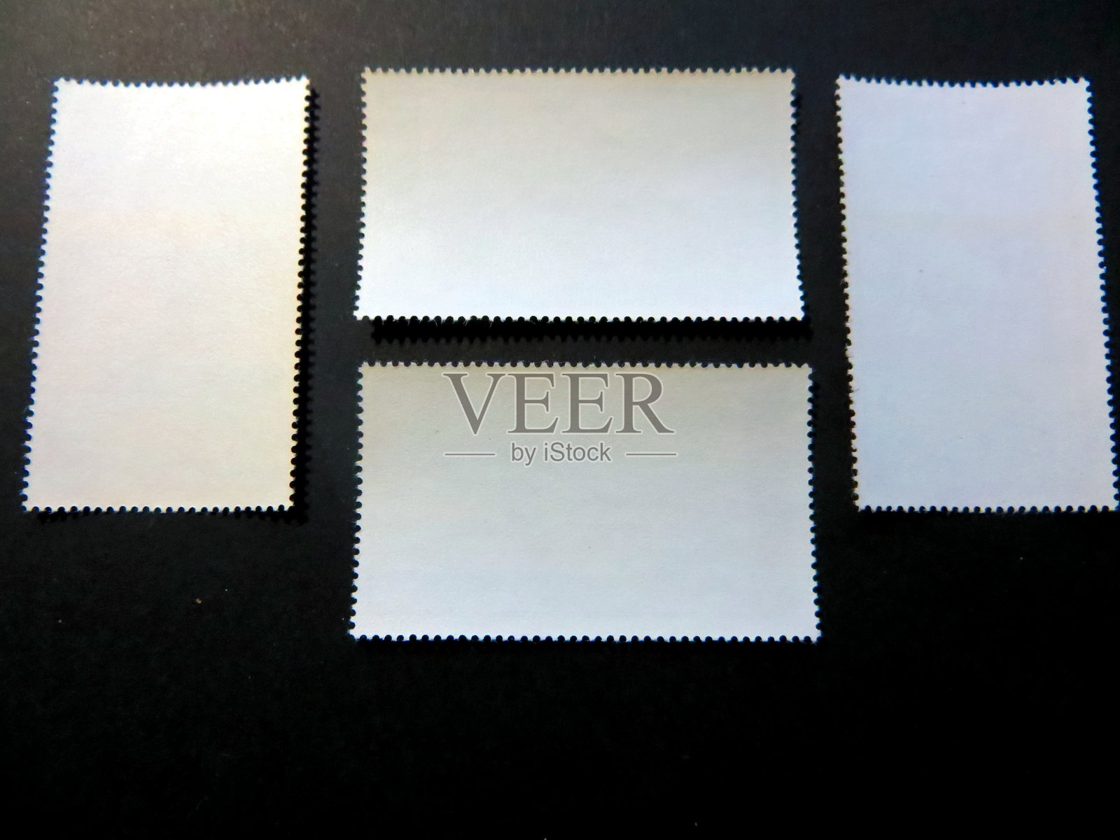 来自不同地区的邮票收藏中邮票背面的探索照片摄影图片