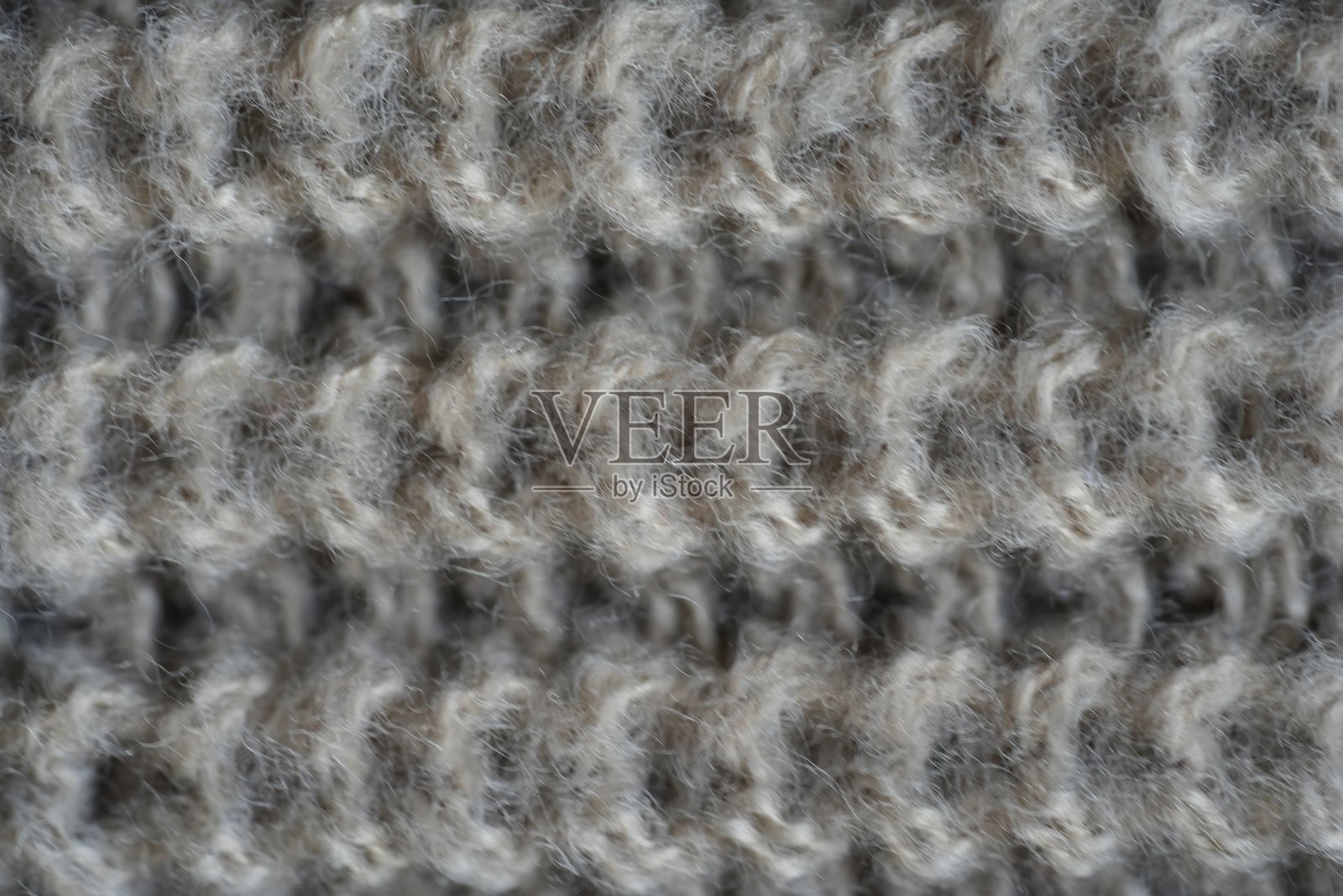 米白色针织丙烯面料的纹理照片摄影图片