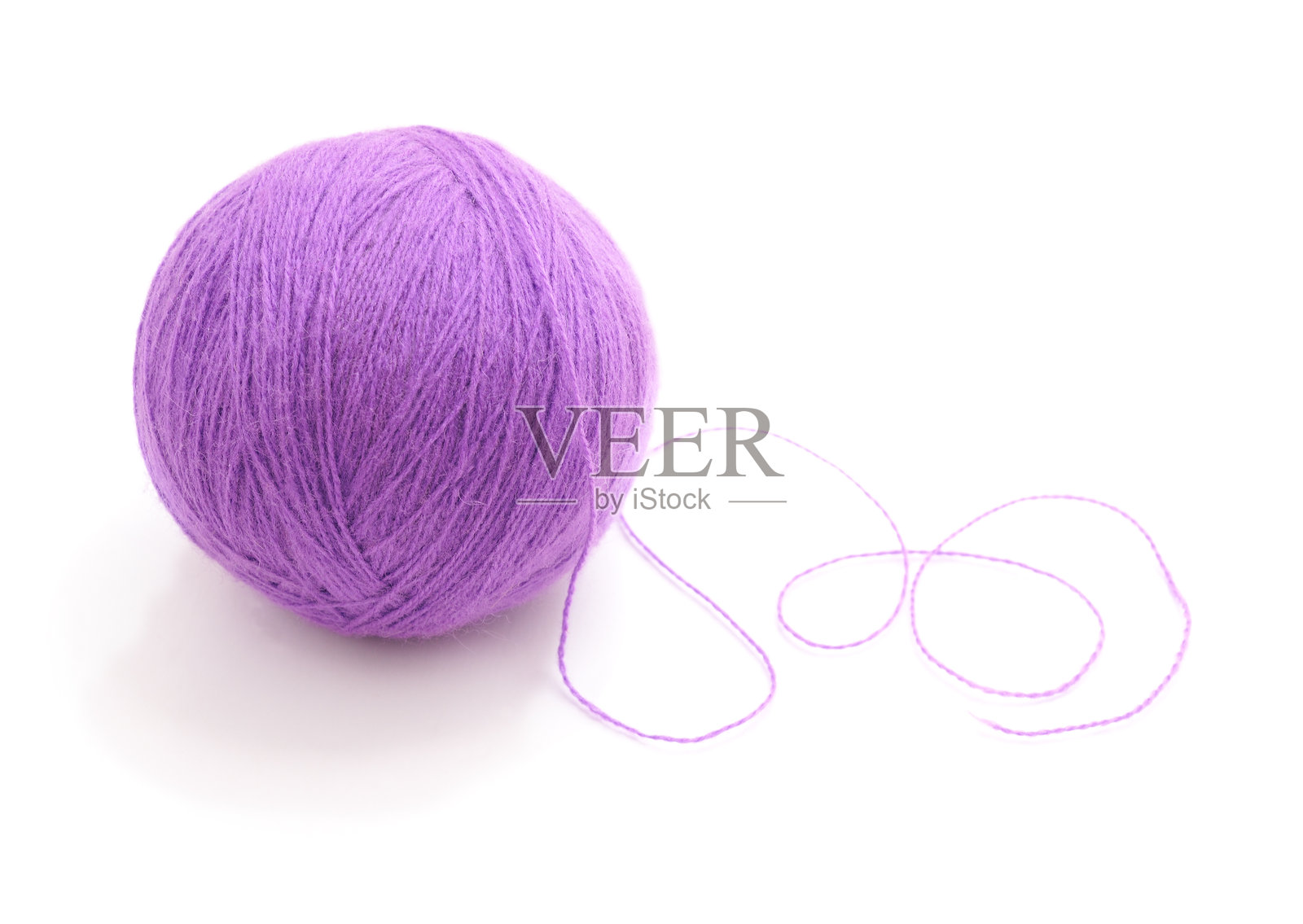 紫色毛线球。照片摄影图片
