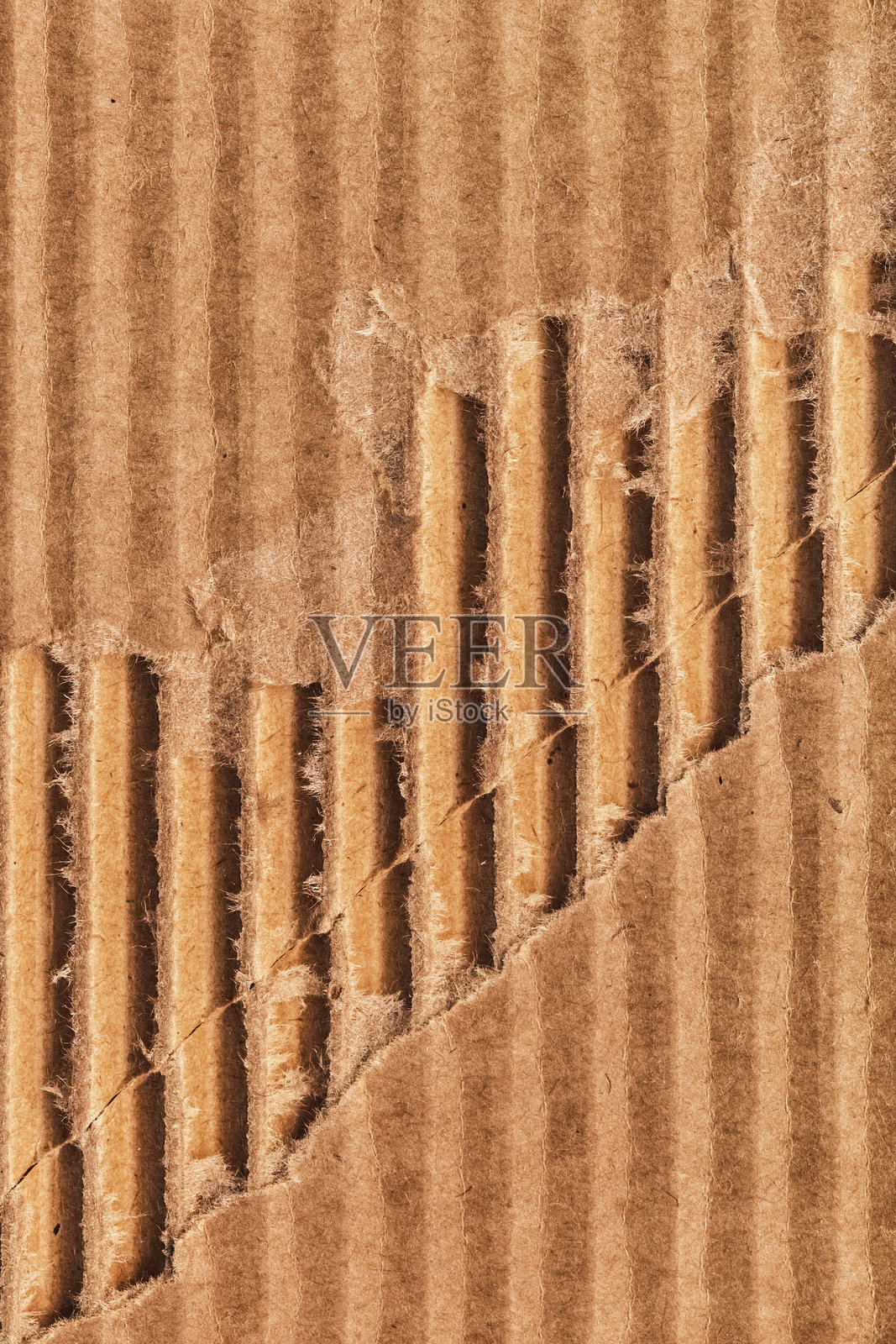 回收的棕色瓦楞纸板撕裂皱褶粗糙磨损纹理样本照片摄影图片