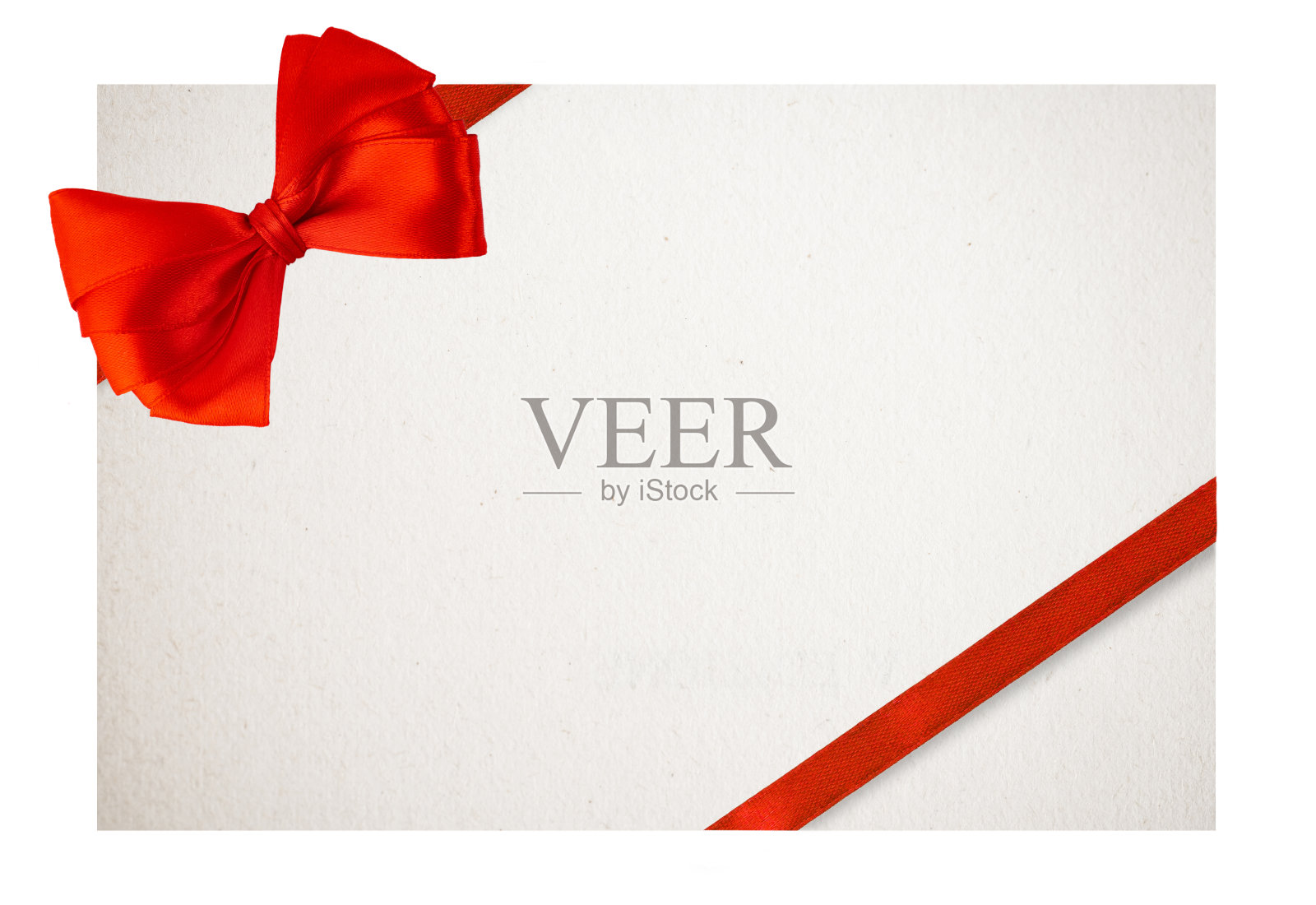 节日红色蝴蝶结在圣诞贺卡背景上照片摄影图片