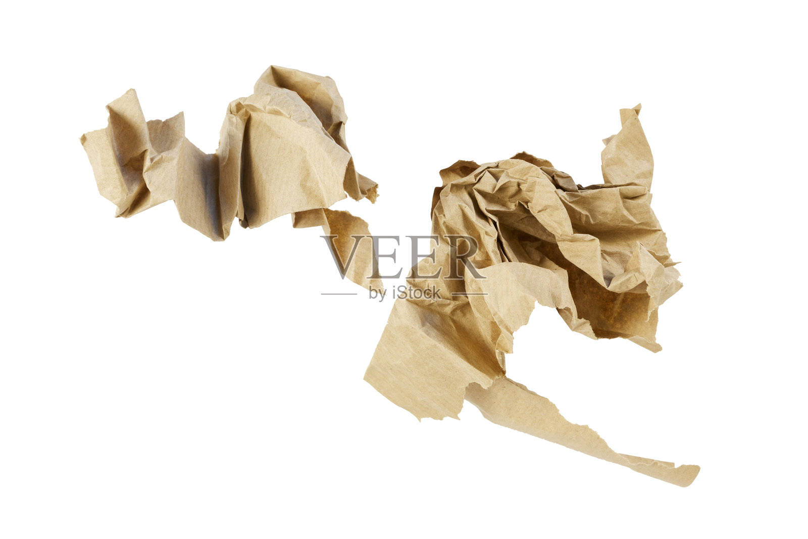 孤立在白色背景上的皱巴巴的棕色纸团照片摄影图片