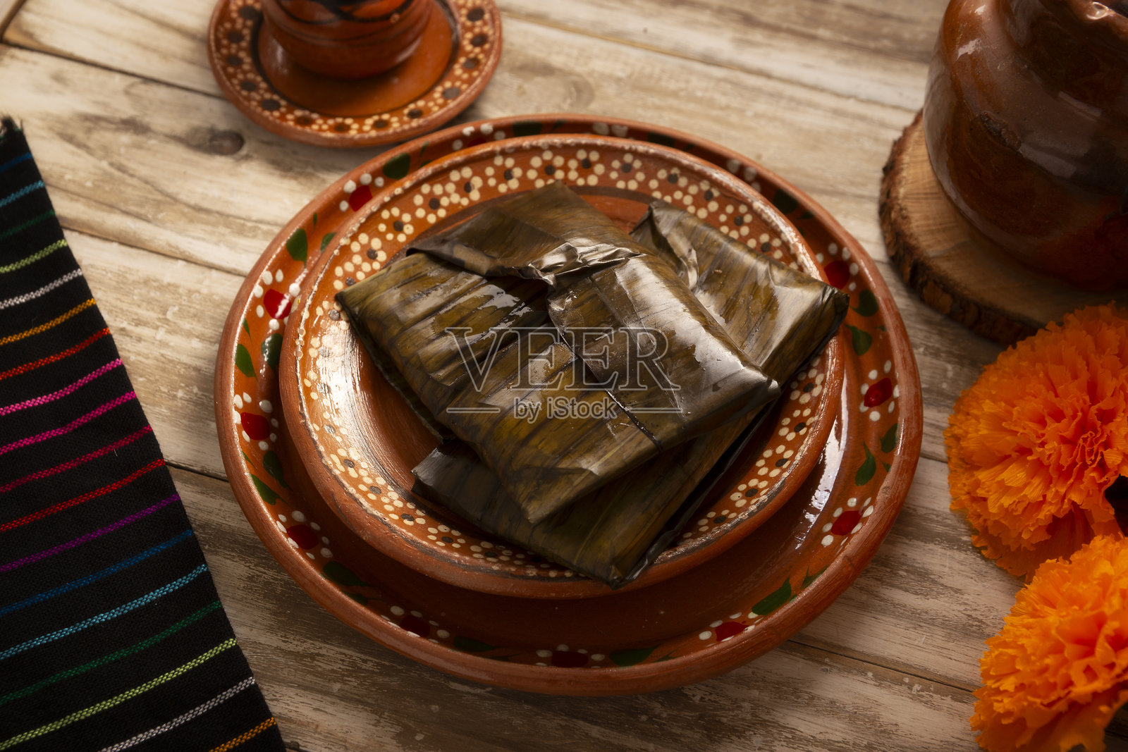 墨西哥瓦哈卡香蕉叶包裹的玉米粽照片摄影图片