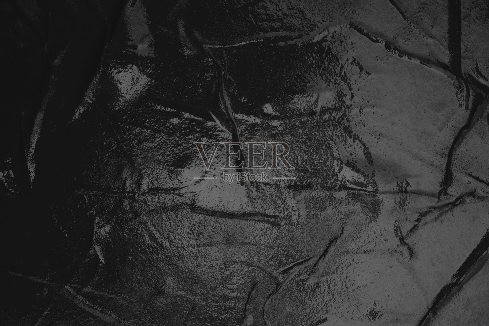 空皱黑湿纸张空白纹理浮雕纹理复制空间墙壁背景。照片摄影图片