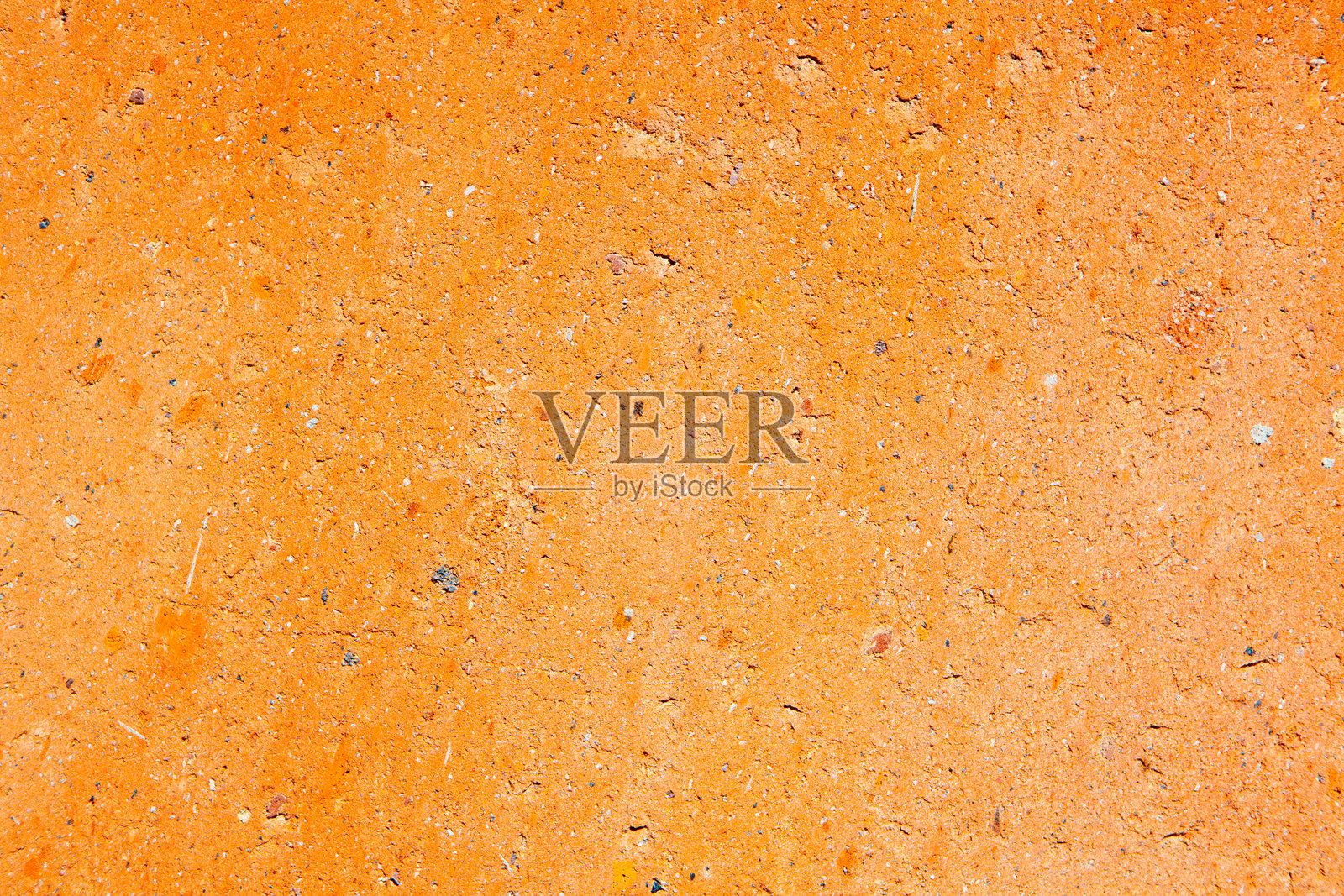 橙色水泥墙背景和纹理。用于设计的抽象背景和纹理。照片摄影图片