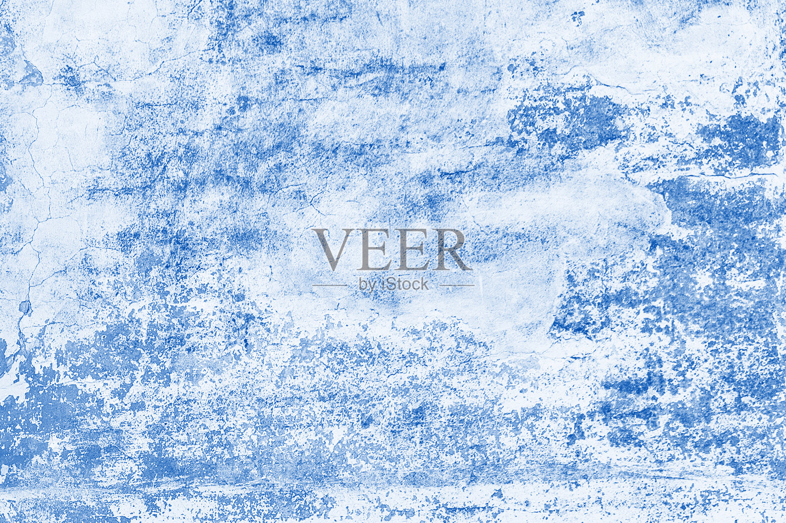 优雅的蓝色背景。富含蓝色墙壁纹理的污垢背景，带有阴影边框和发光中心。照片摄影图片