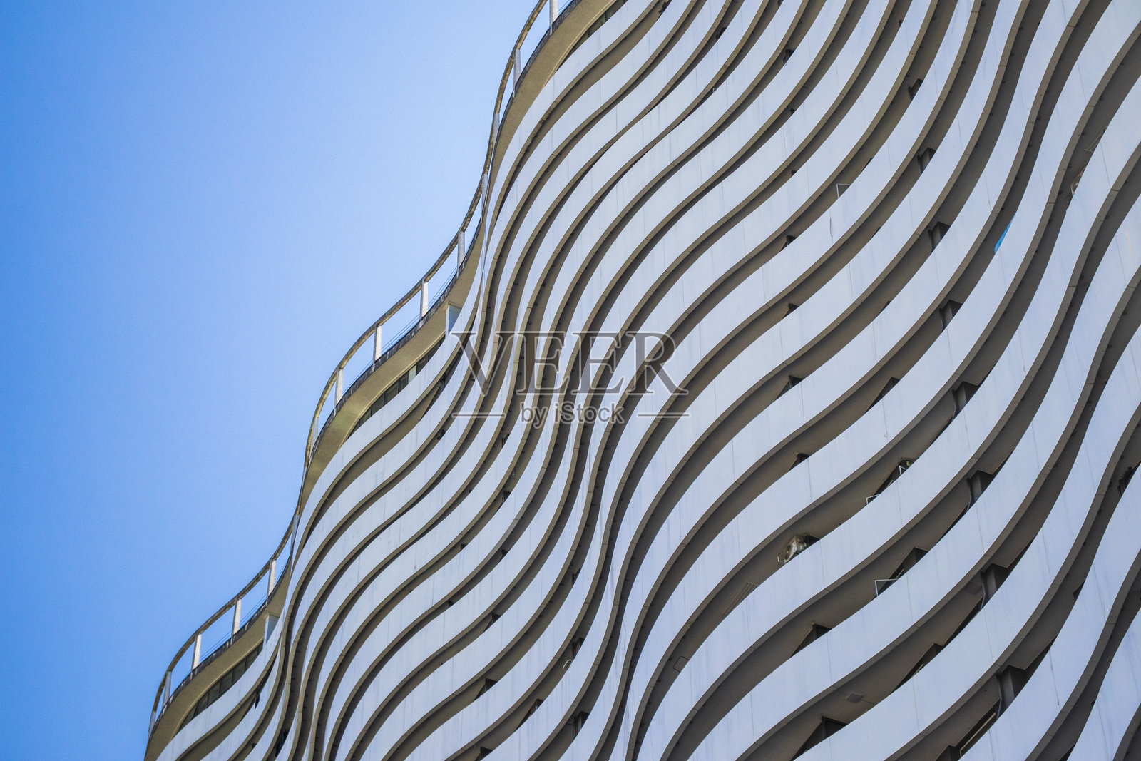 现代建筑的波浪形外观。都市照片摄影图片