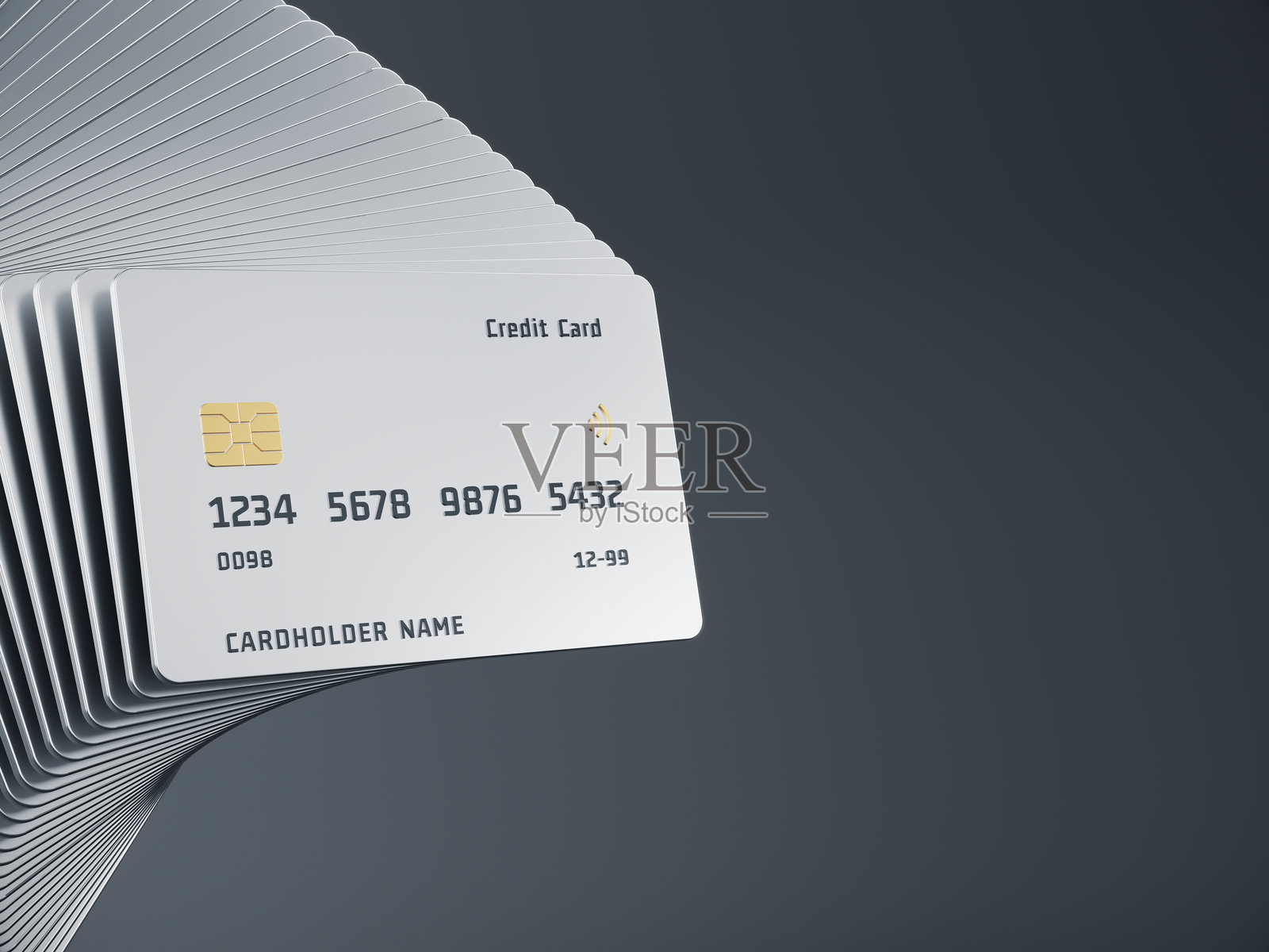 深色背景上的金属信用卡。照片摄影图片