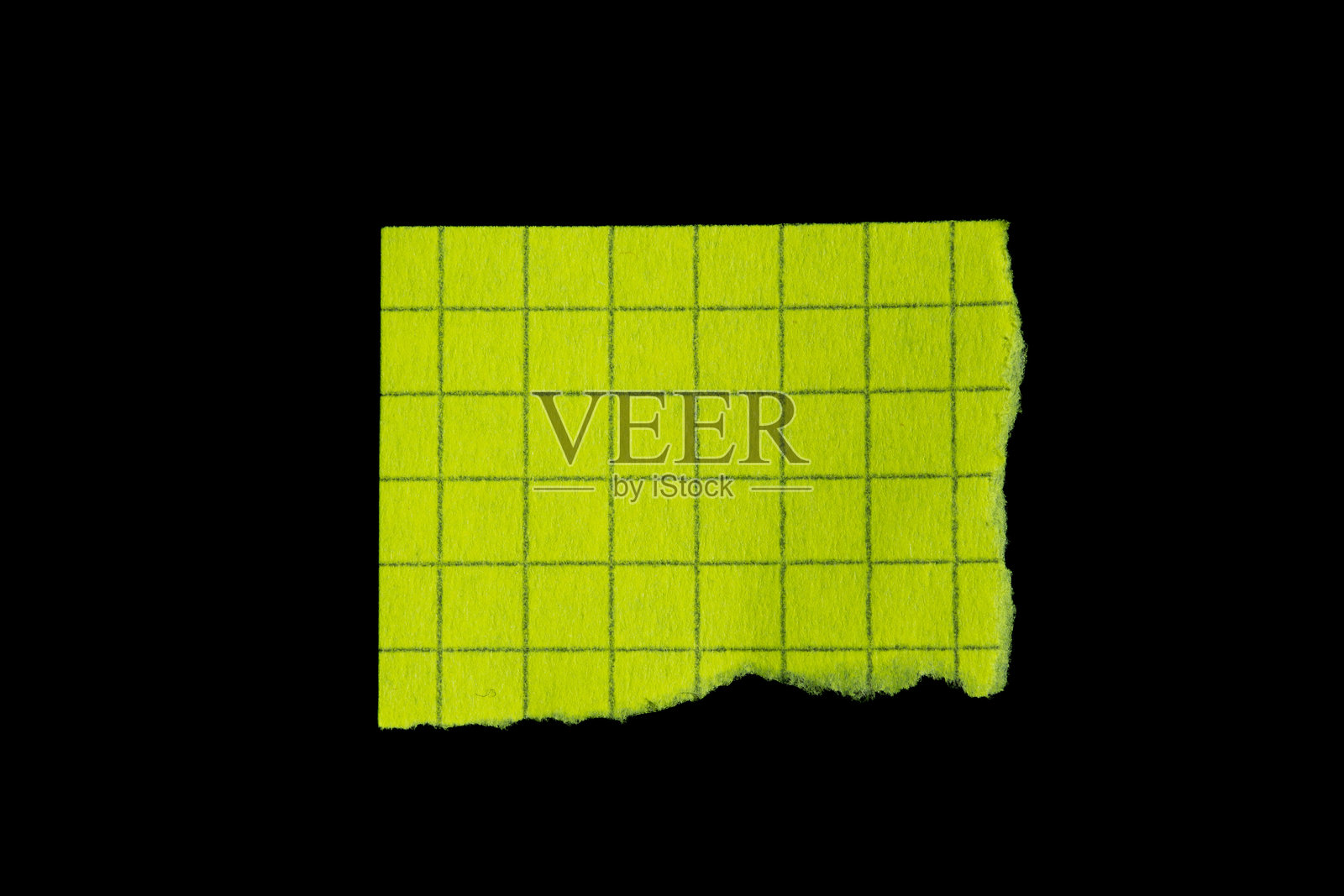 撕裂边缘的黄色网格便签纸照片摄影图片