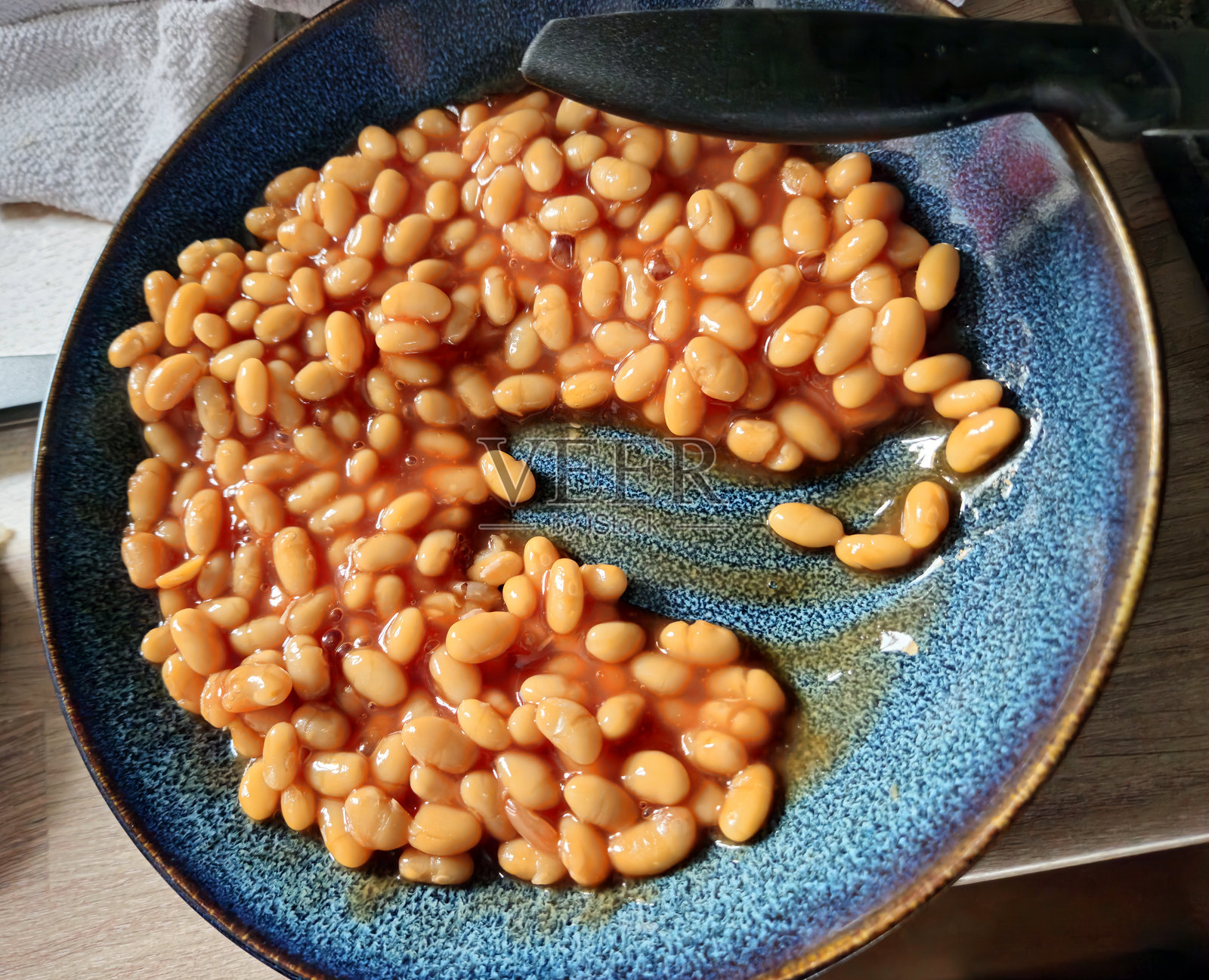 一锅番茄酱焗豆照片摄影图片