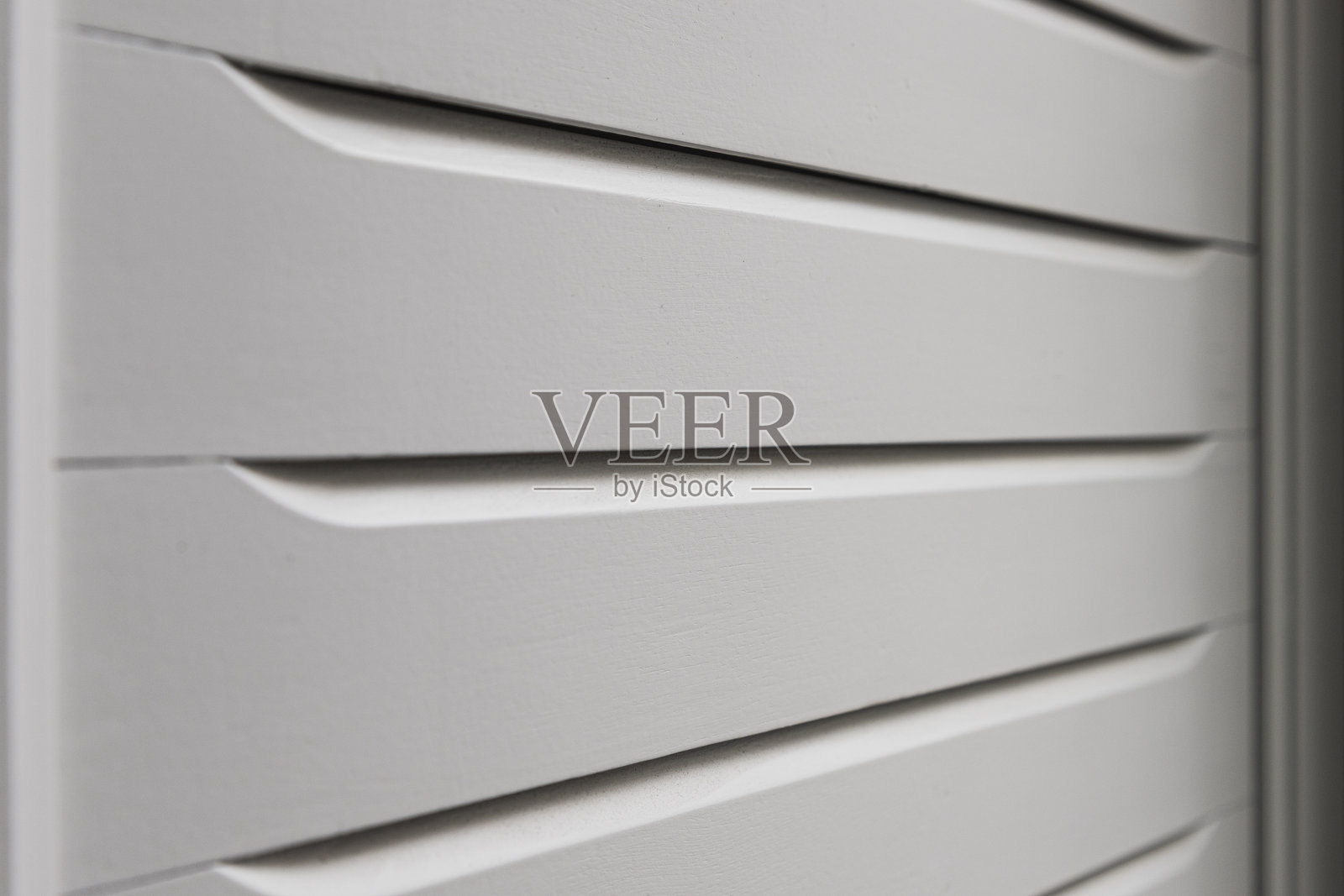 白色木门木板的特写镜头。照片摄影图片