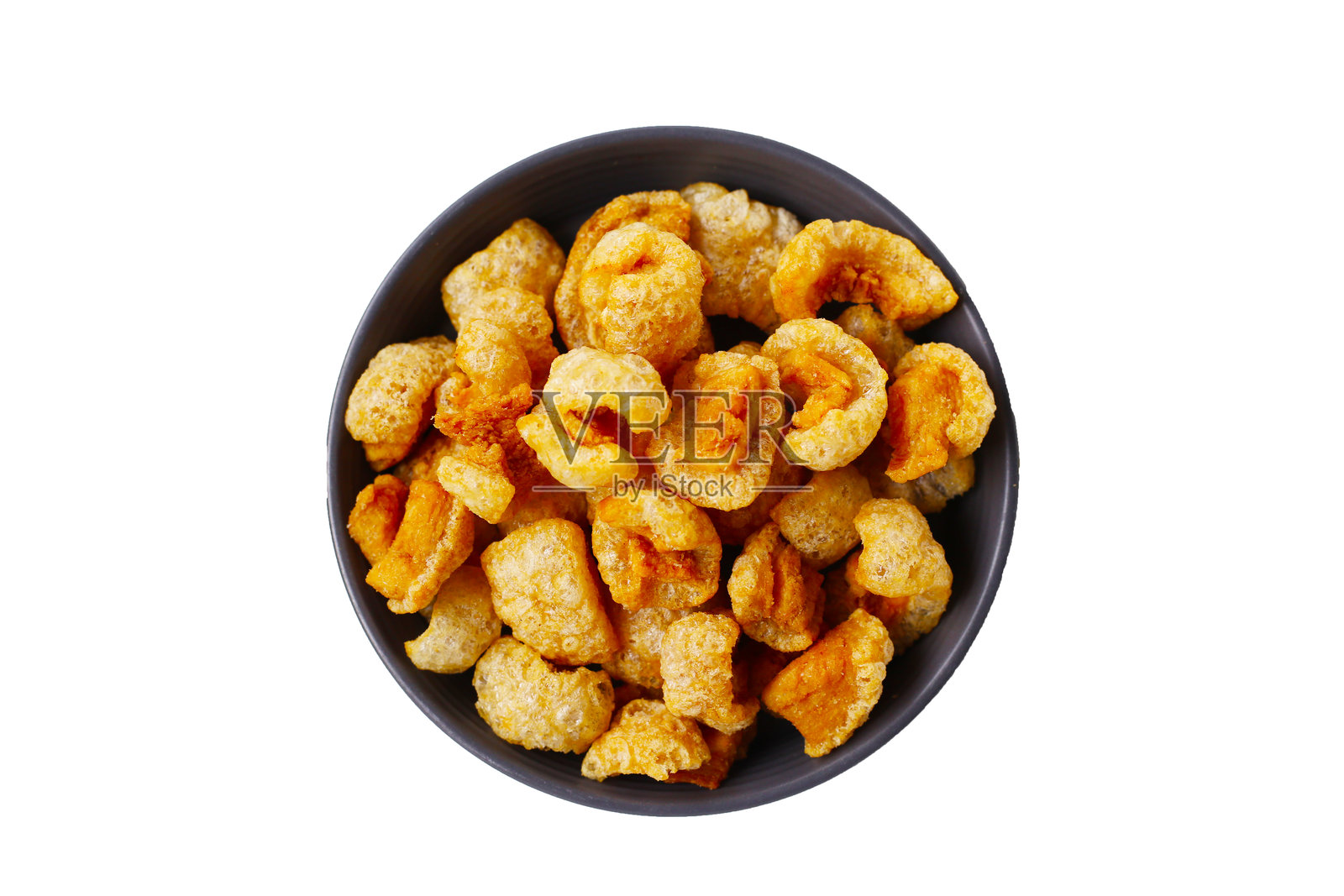 酥脆的炸猪皮，一种嘎嘣脆的美味零食。照片摄影图片