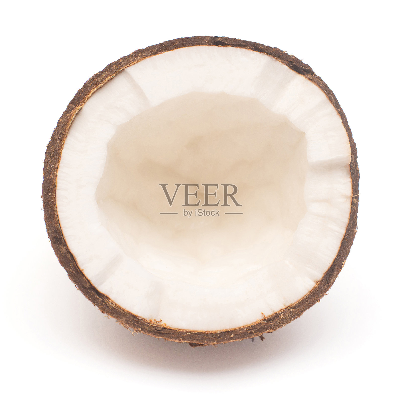 椰子果实对半切开，孤立在白色背景上。热带，棕榈。俯视，顶视图。照片摄影图片