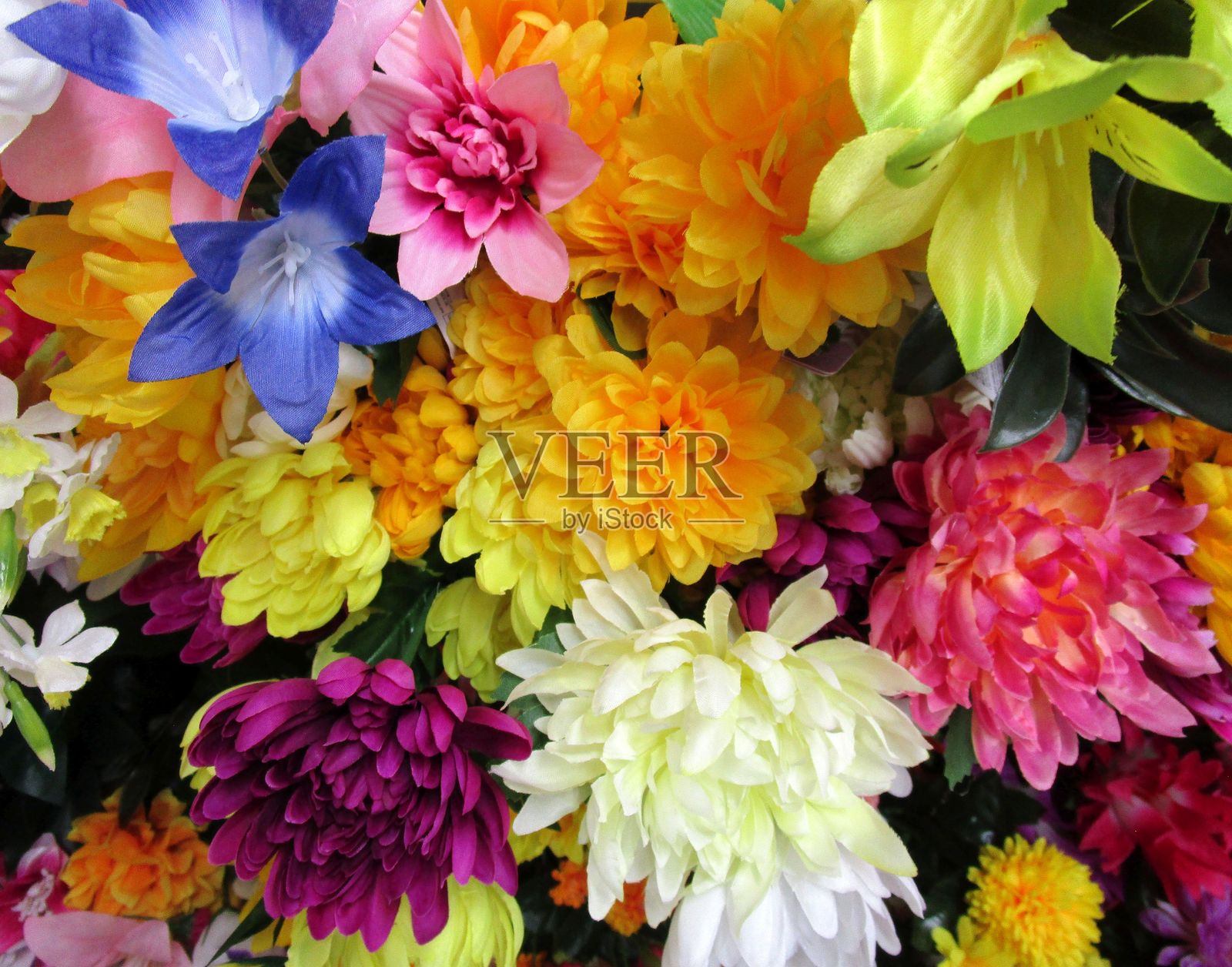 色彩缤纷的仿真花束照片摄影图片