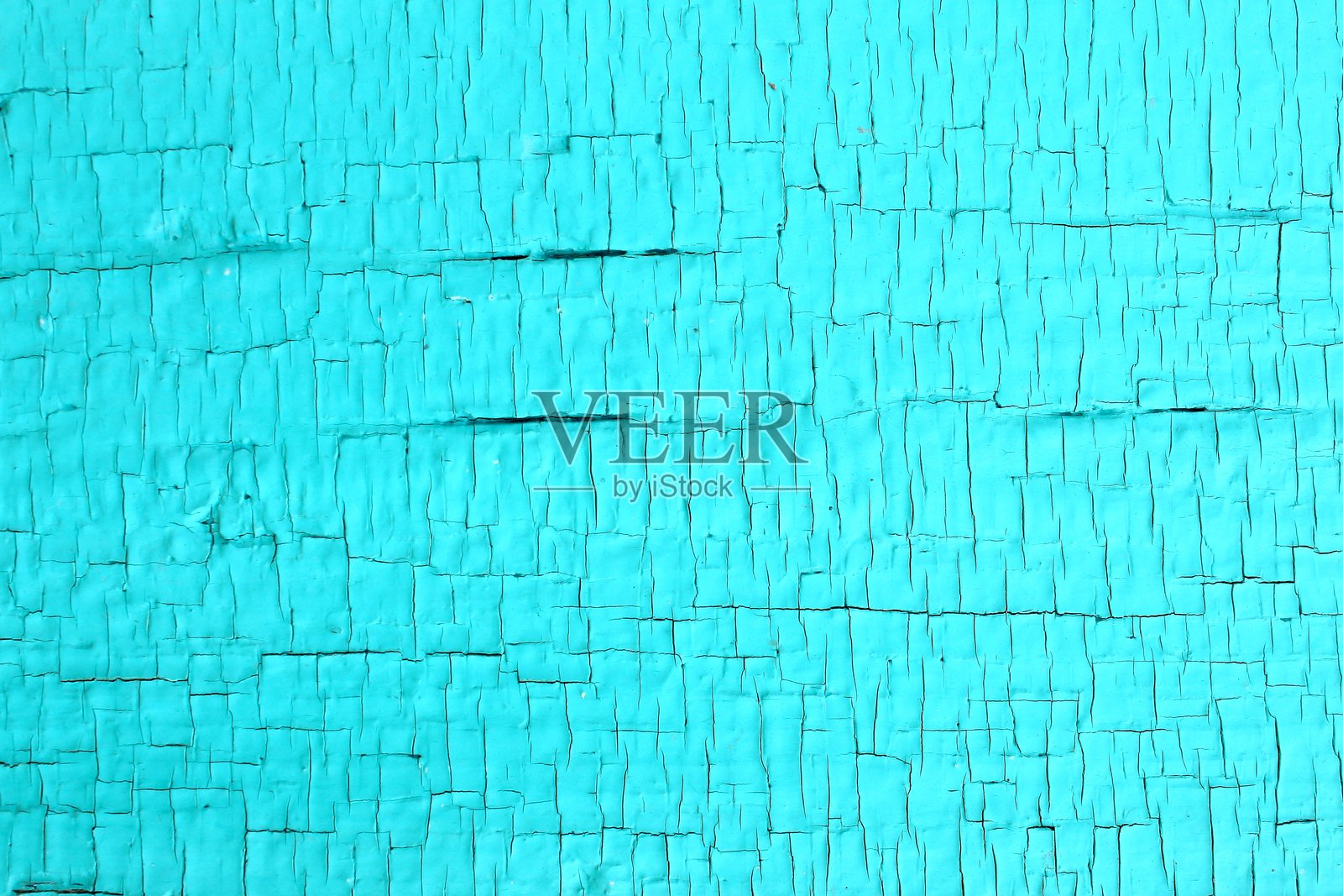 木材纹理，带有褪色的绿松石色剥落油漆。照片摄影图片