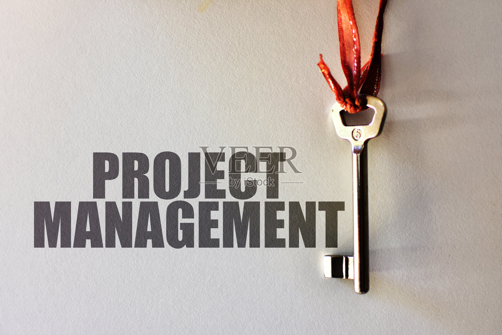 商业概念：项目管理，背景为复古纹理墙照片摄影图片