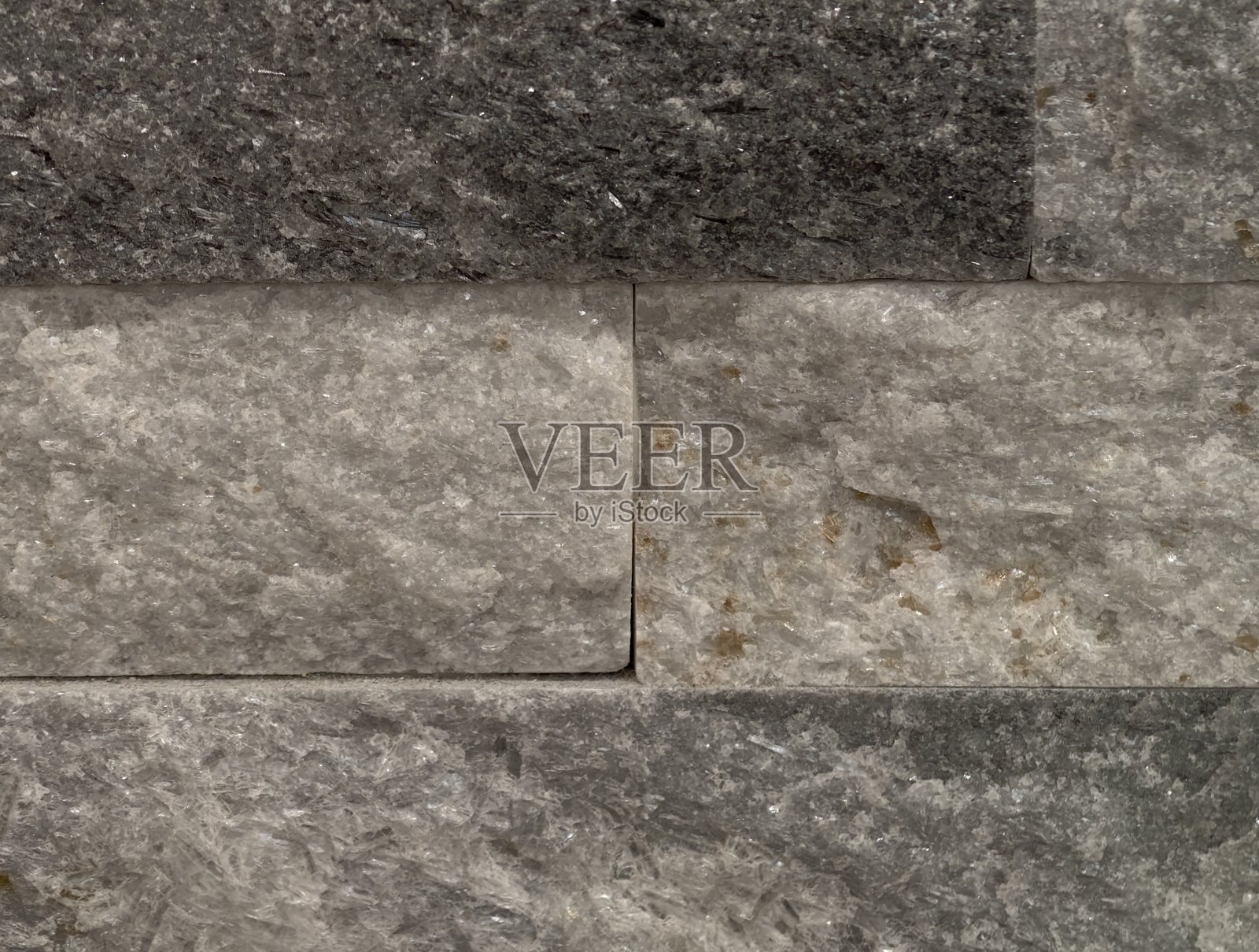 石墙表面，纹理灰色石墙，水平对齐整齐，色调柔和照片摄影图片