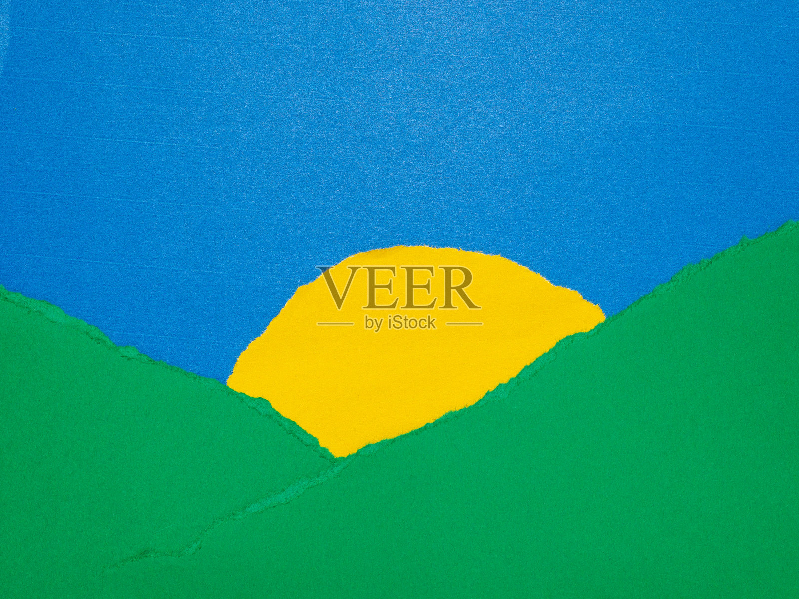 抽象撕纸风格的日出风景，有绿色山丘和蓝色天空照片摄影图片