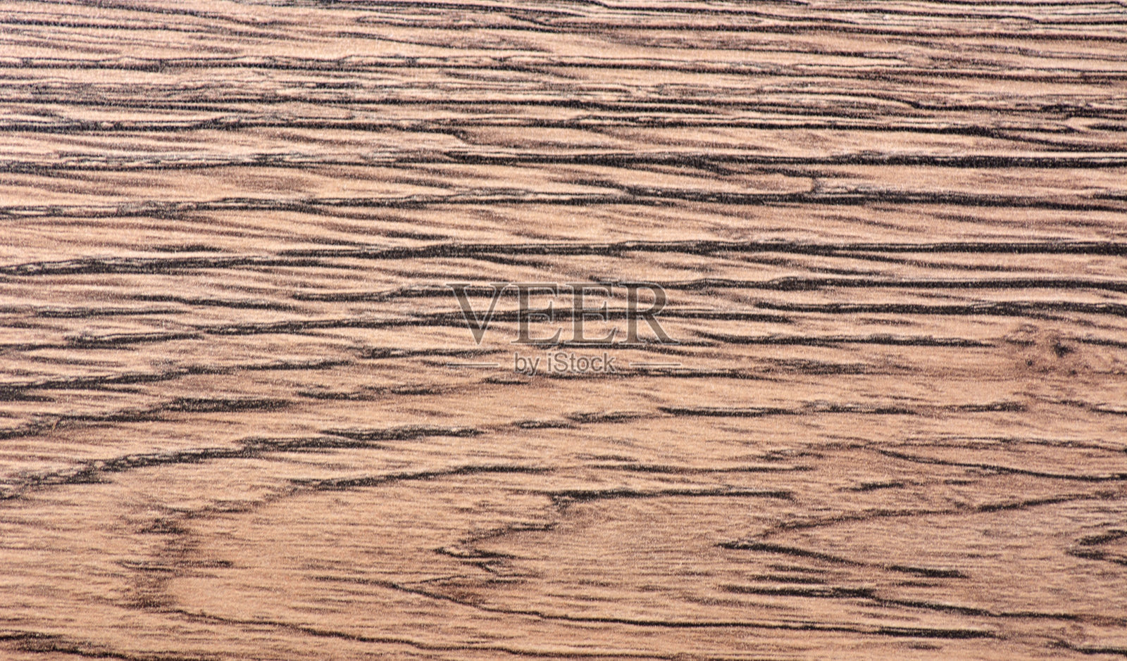 深色橡木，带有条纹和漩涡的天然木纹，特写。照片摄影图片